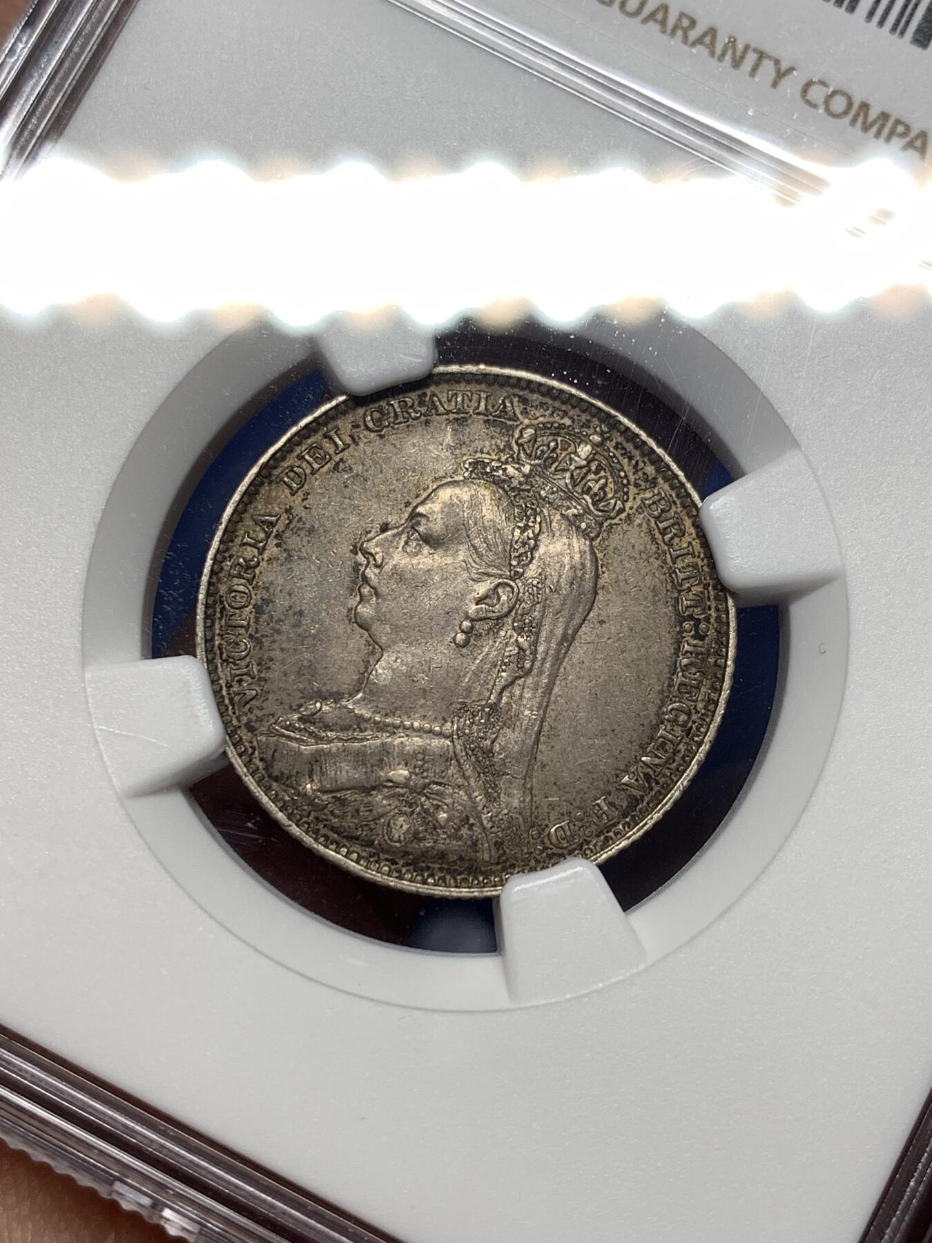 《竞宝斋》第475场 周日，周一 2场连拍 （全场包邮）欢迎送拍 NGC AU58 英国 1891年 维多利亚高冠 1先令银币 原味包浆