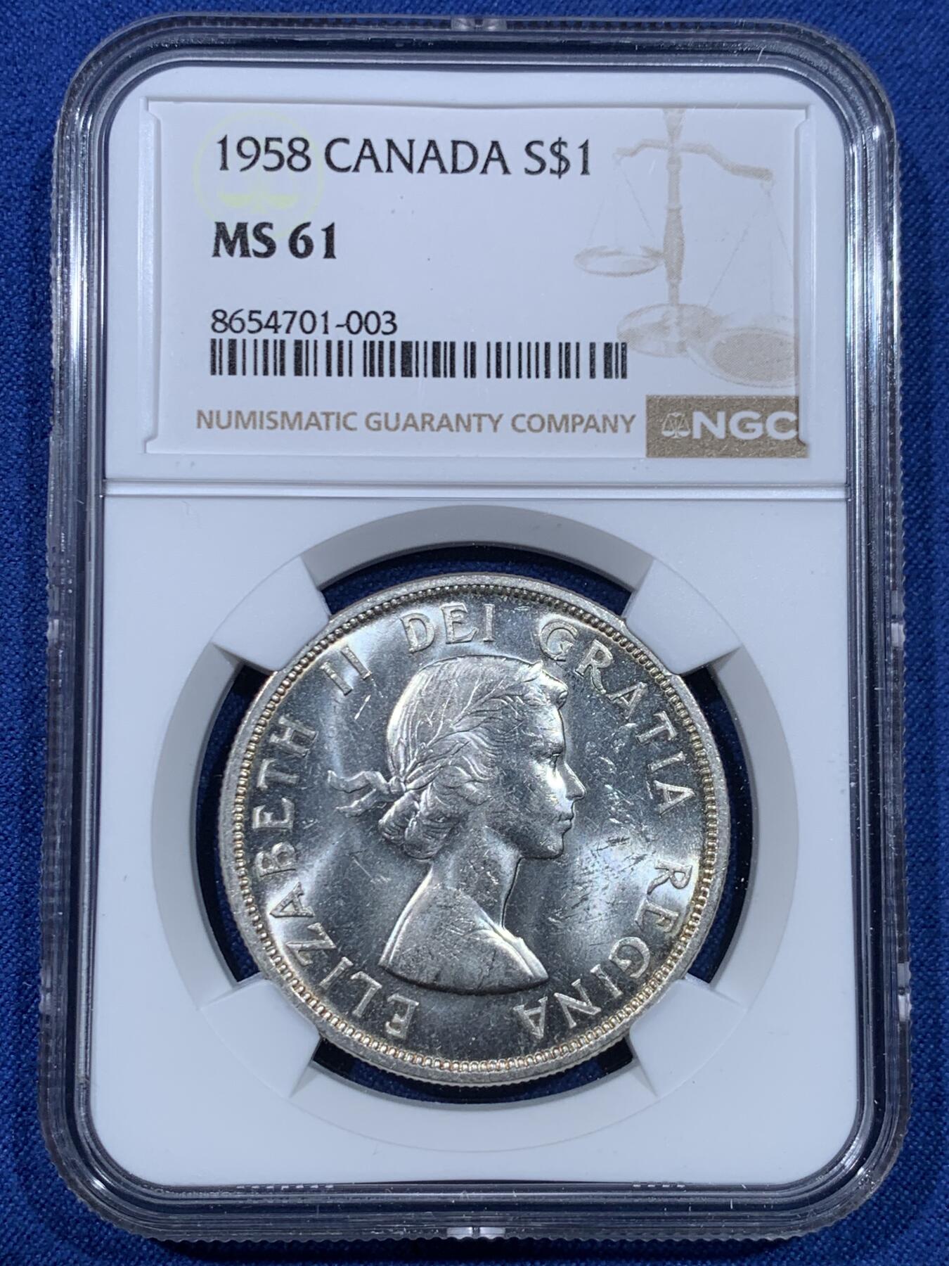 《竞宝斋》第475场 周日，周一 2场连拍 （全场包邮）欢迎送拍 NGC MS61 加拿大1958年不列颠哥伦比亚省百年纪念1元银币 伊丽莎白女王年轻头像+原住民图腾