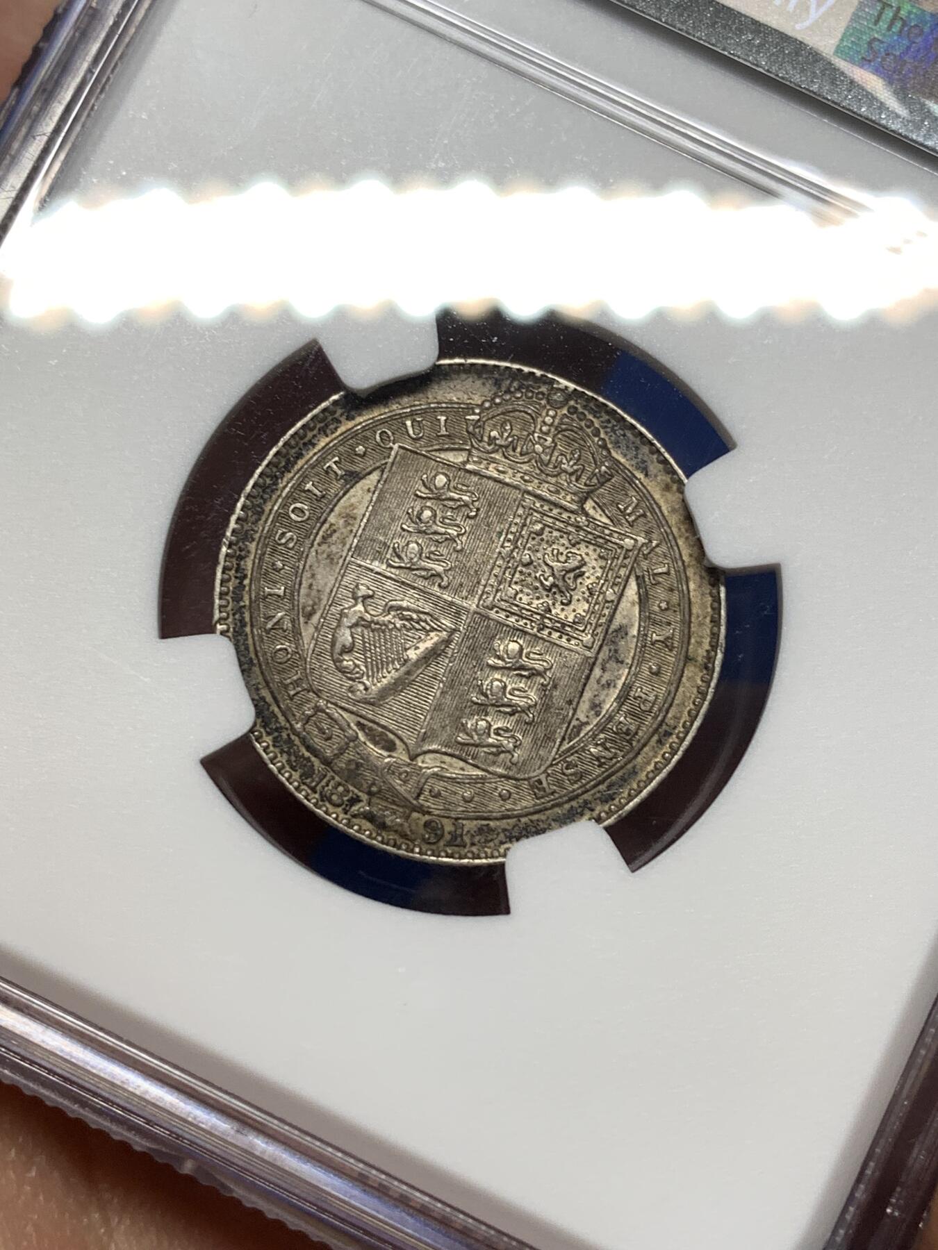 《竞宝斋》第475场 周日，周一 2场连拍 （全场包邮）欢迎送拍 NGC AU58 英国 1891年 维多利亚高冠 1先令银币 原味包浆