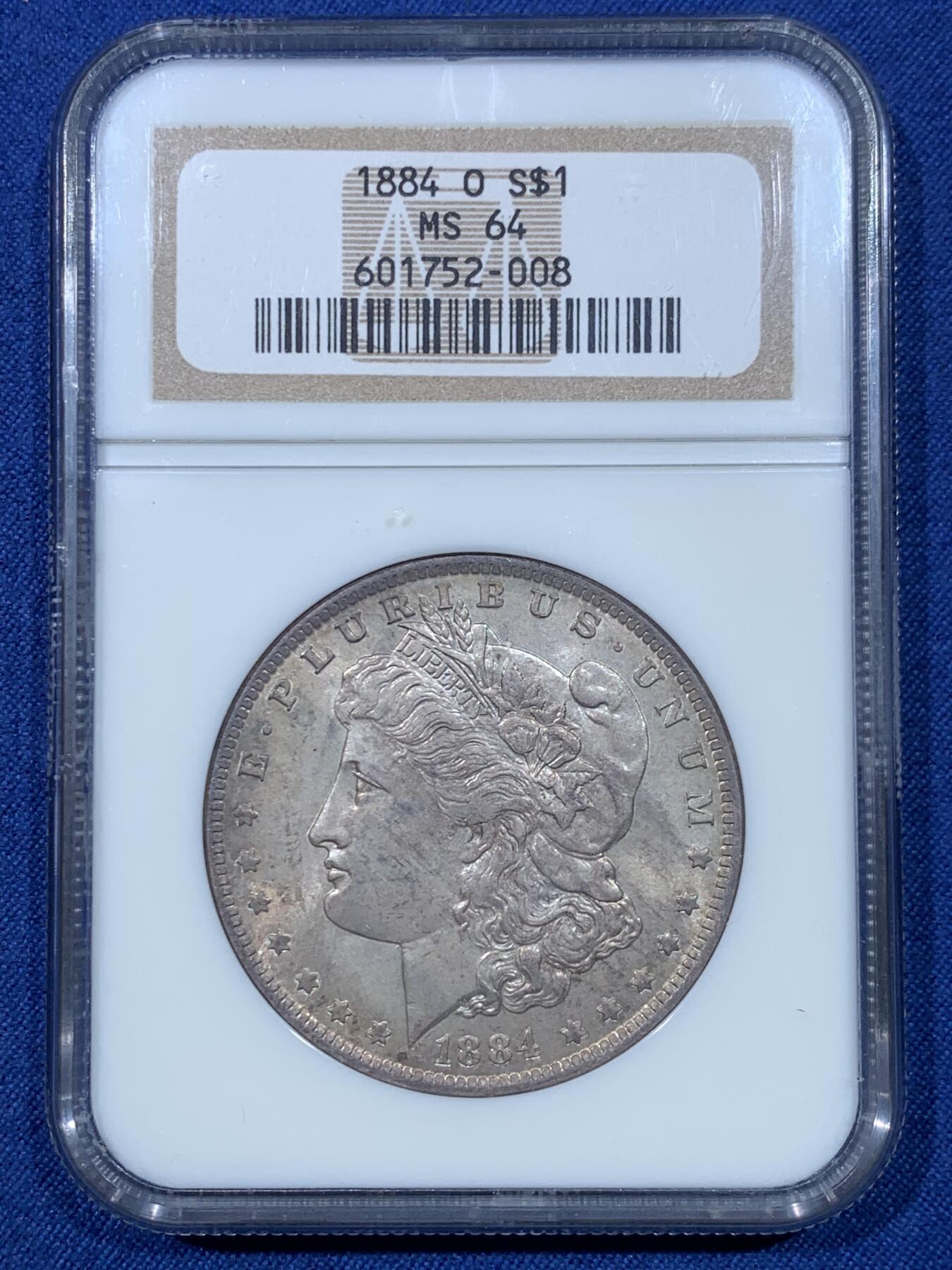 《竞宝斋》第475场 周日，周一 2场连拍 （全场包邮）欢迎送拍 NGC MS64 美国 1884年 新奥尔良厂 1美元 摩根银币 六位数编号经典老盒 双面淡五彩包浆