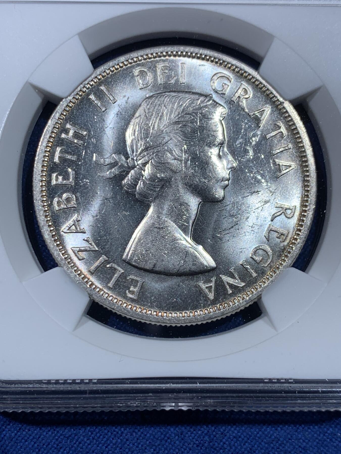 《竞宝斋》第475场 周日，周一 2场连拍 （全场包邮）欢迎送拍 NGC MS61 加拿大1958年不列颠哥伦比亚省百年纪念1元银币 伊丽莎白女王年轻头像+原住民图腾