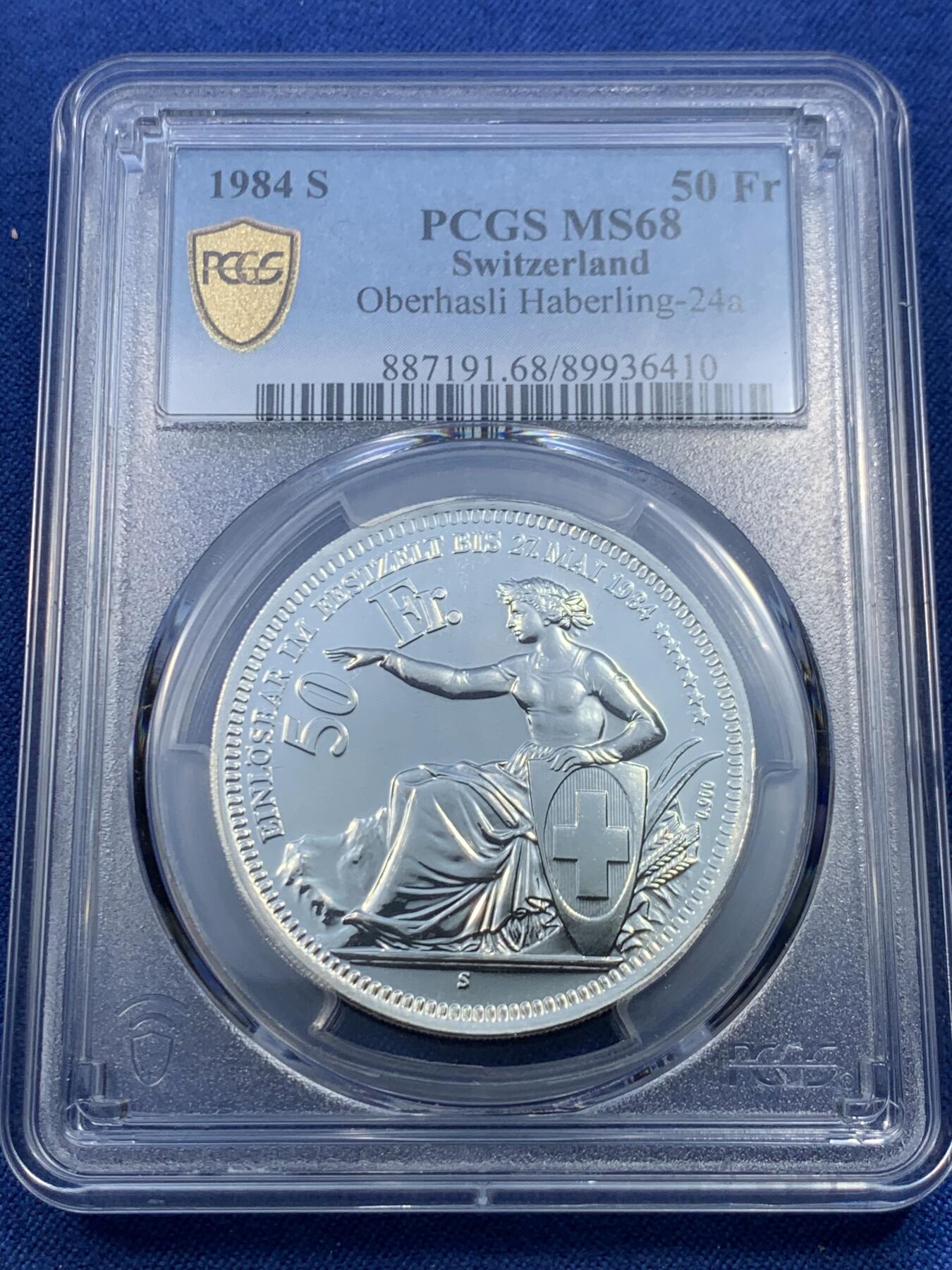 《竞宝斋》第475场 周日，周一 2场连拍 （全场包邮）欢迎送拍 PCGS MS68 瑞士1984年奥伯哈斯利射击节50法郎纪念银币，直径38毫米，重量25克，900银，发行量6000枚。类PL底板，币面清爽干净又舒适，转光强烈细节优秀，状态佳。