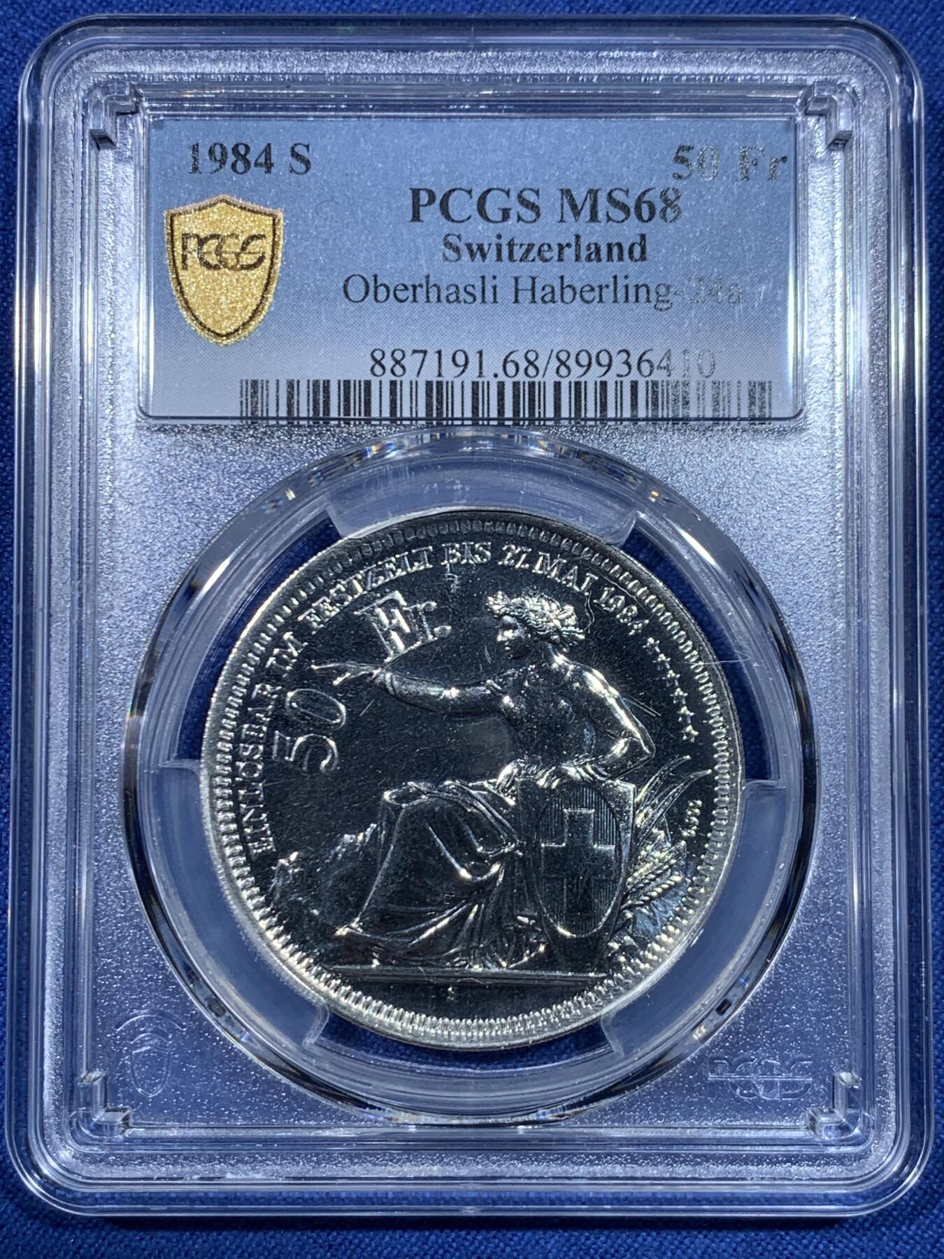 《竞宝斋》第475场 周日，周一 2场连拍 （全场包邮）欢迎送拍 PCGS MS68 瑞士1984年奥伯哈斯利射击节50法郎纪念银币，直径38毫米，重量25克，900银，发行量6000枚。类PL底板，币面清爽干净又舒适，转光强烈细节优秀，状态佳。