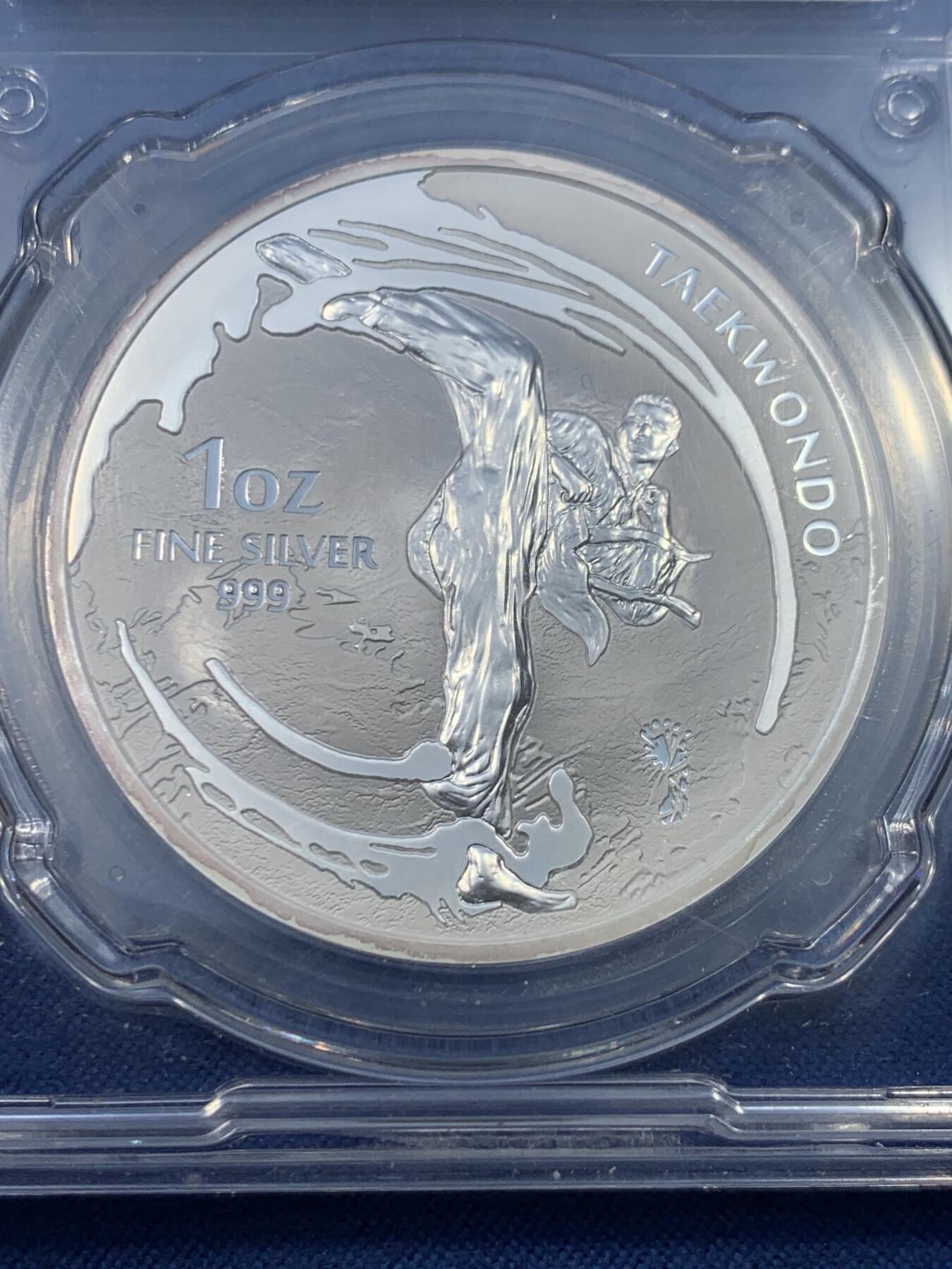 《竞宝斋》第475场 周日，周一 2场连拍 （全场包邮）欢迎送拍 信泰 MS69 韩国2019年跆拳道银章 一盎司999银 细节见图