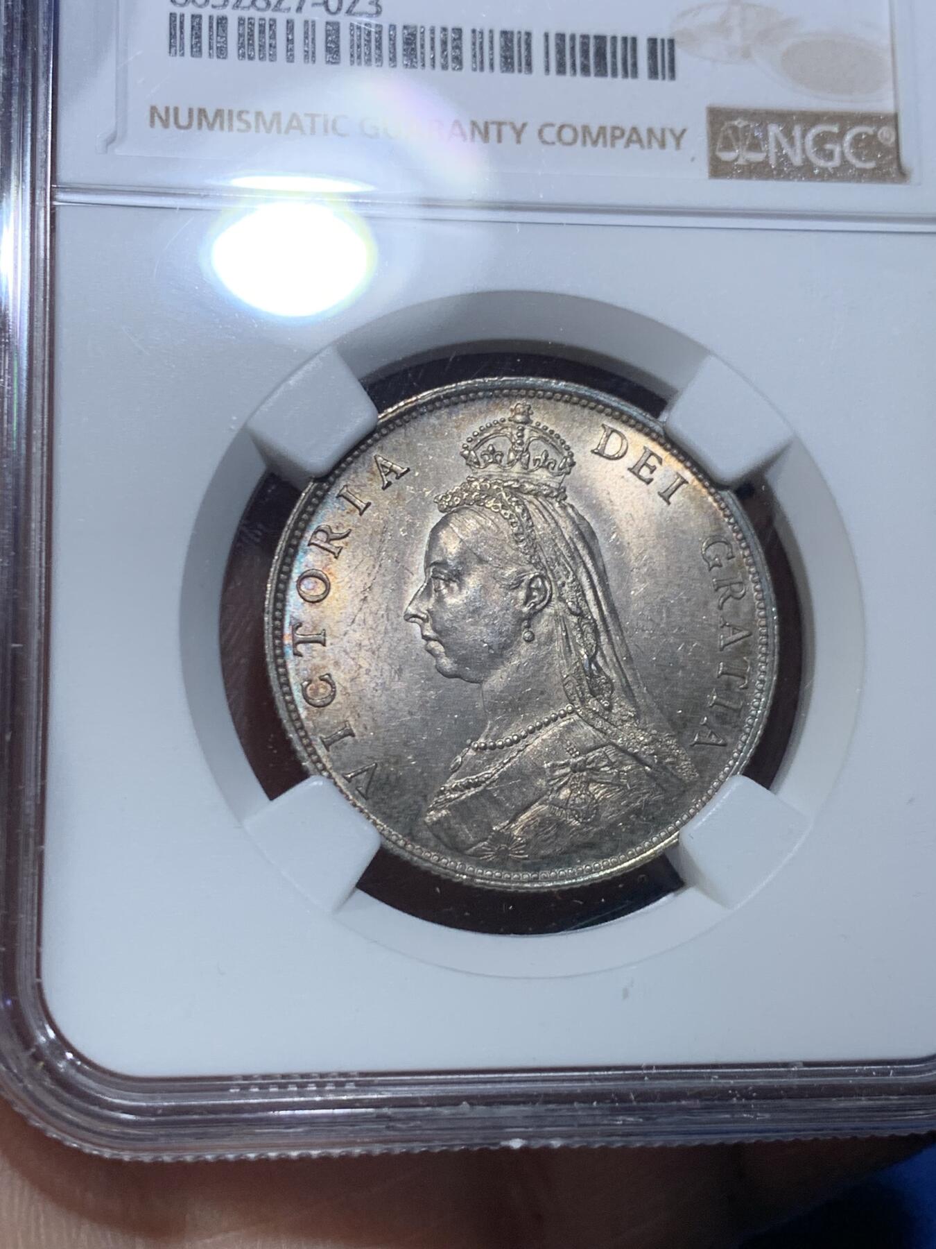 《竞宝斋》第475场 周日，周一 2场连拍 （全场包邮）欢迎送拍 NGC MS62 英国1887年高冠1弗洛林银币，淡包浆，转光不错