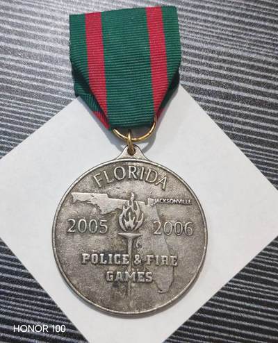 纪念章/纪念币 - Jeep 赞助的佛罗里达警察与消防运动会（Florida Police & Fire Games）纪念奖章，用于表彰参赛的警务和消防人员。