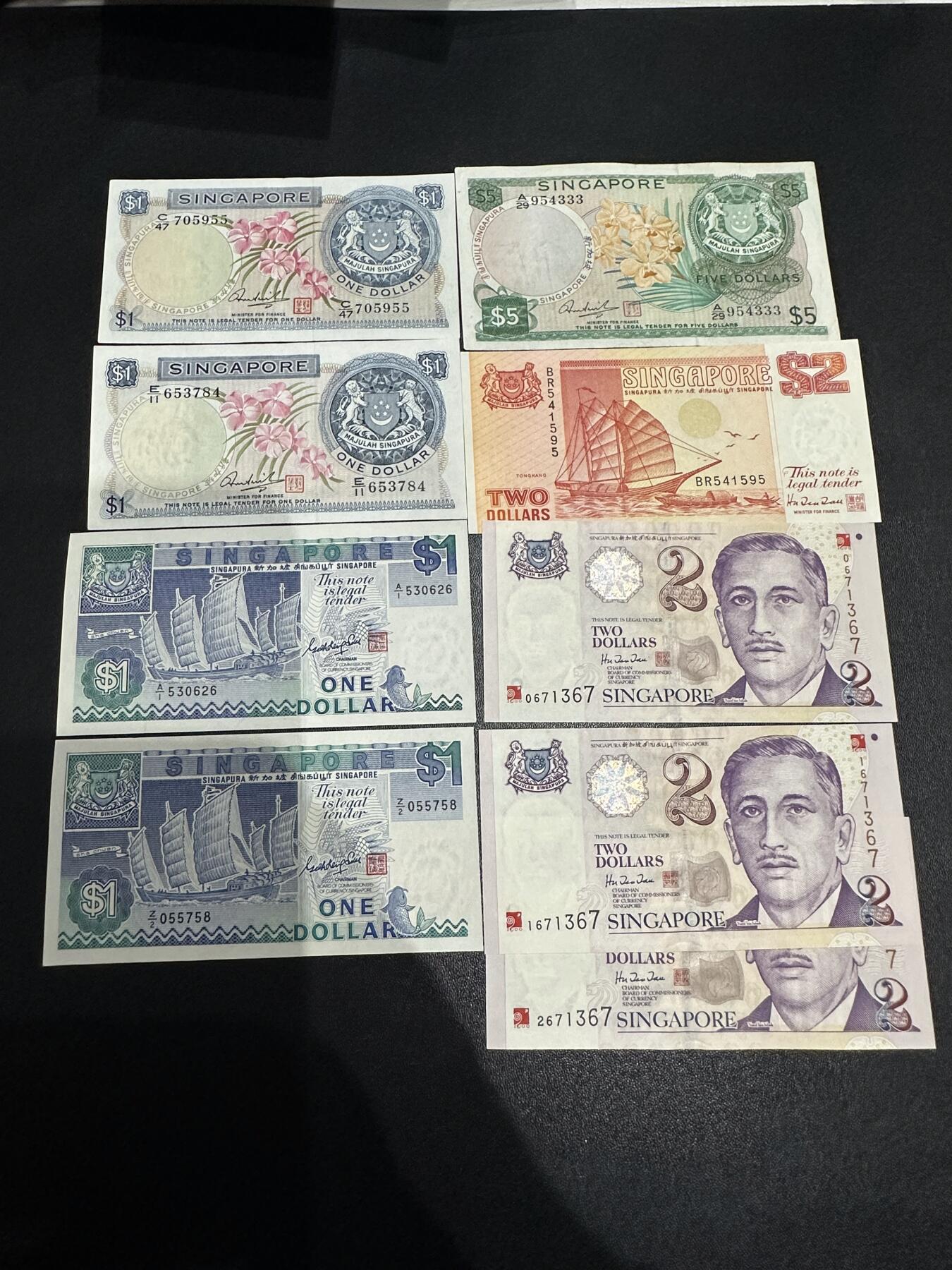 《外钞收藏家》第六百二十二期（精品场）（长期征集拍品、欢迎藏友们联系合作） 新加坡花、船、人像版 9张一起 人像有潮斑 其他非全新