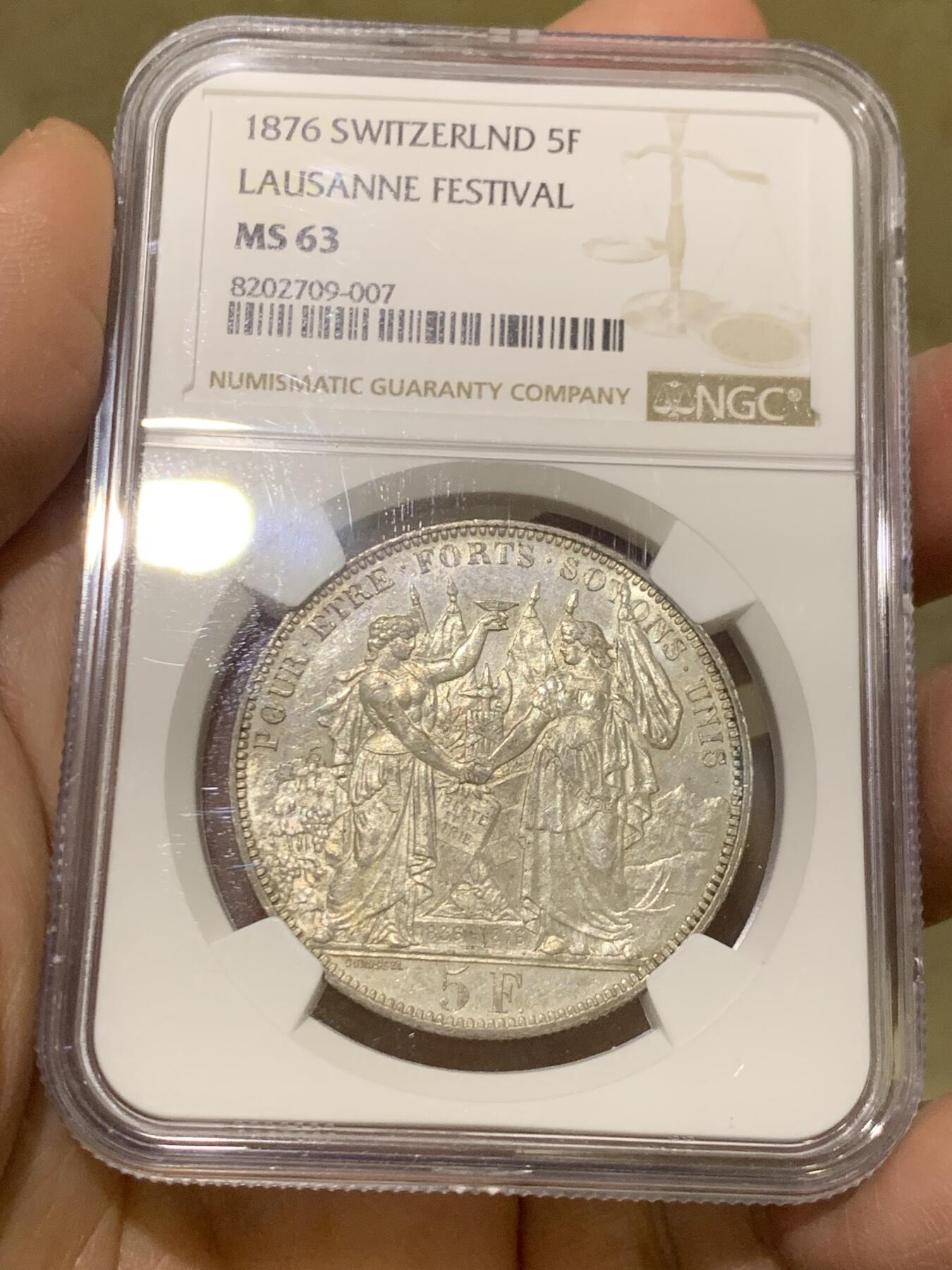 《竞宝斋》第475场 周日，周一 2场连拍 （全场包邮）欢迎送拍 NGC MS63 瑞士1876年洛桑射击节5法郎银币。双面光度非常好，细节极美。