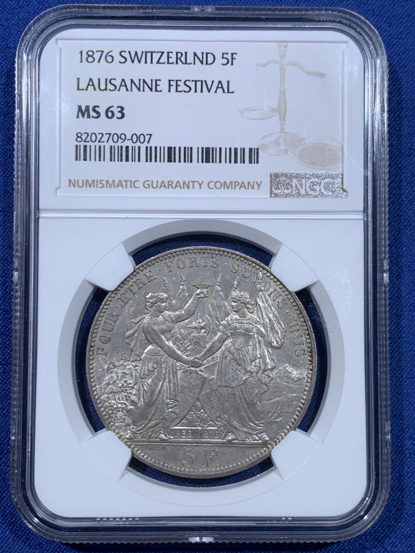 《竞宝斋》第475场 周日，周一 2场连拍 （全场包邮）欢迎送拍 NGC MS63 瑞士1876年洛桑射击节5法郎银币。双面光度非常好，细节极美。