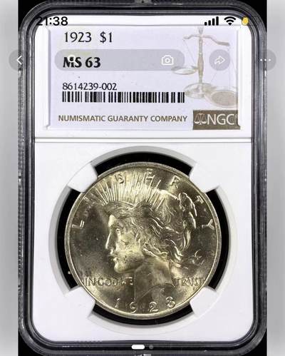 【礼羽收藏】🌏世界钱币拍卖第130期 - 1923年美国和平银元P版NGC-MS63，原汁原味黄油彩老包浆，包浆醇厚润泽又犀利，币面清爽干净又舒适，转光强烈细节优秀，状态极佳。