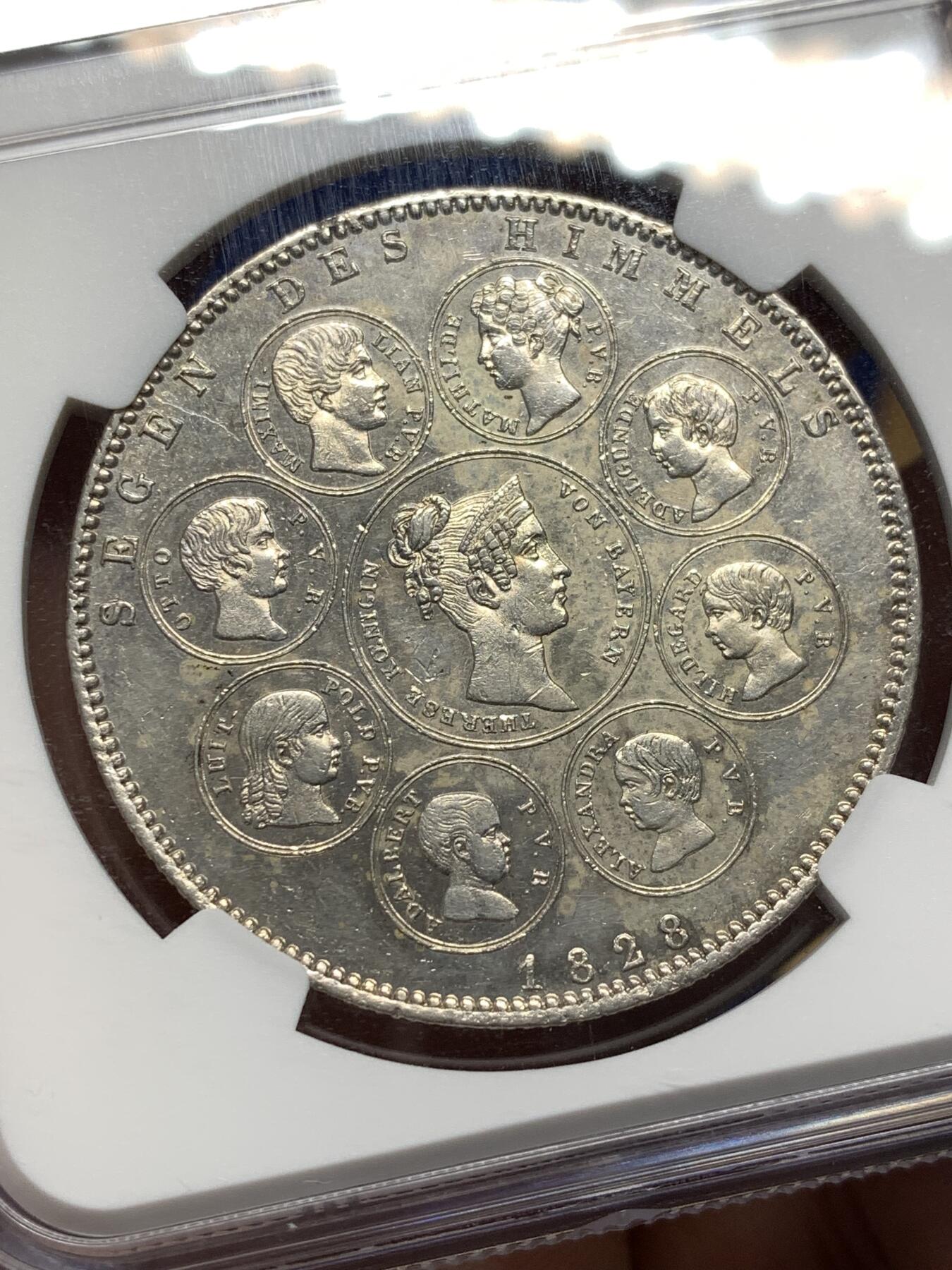 《竞宝斋》第476场 周日，周一 2场连拍 （全场包邮）欢迎送拍 NGC UNC 德意志巴伐利亚王国1828年天堂赐予皇室家族的祝福1泰勒大银币 细节底板都不错 性价比之选