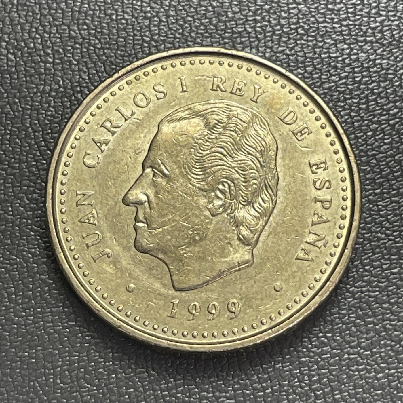 回流0406 西班牙1999年100比塞塔纪念铜币 国际老人年