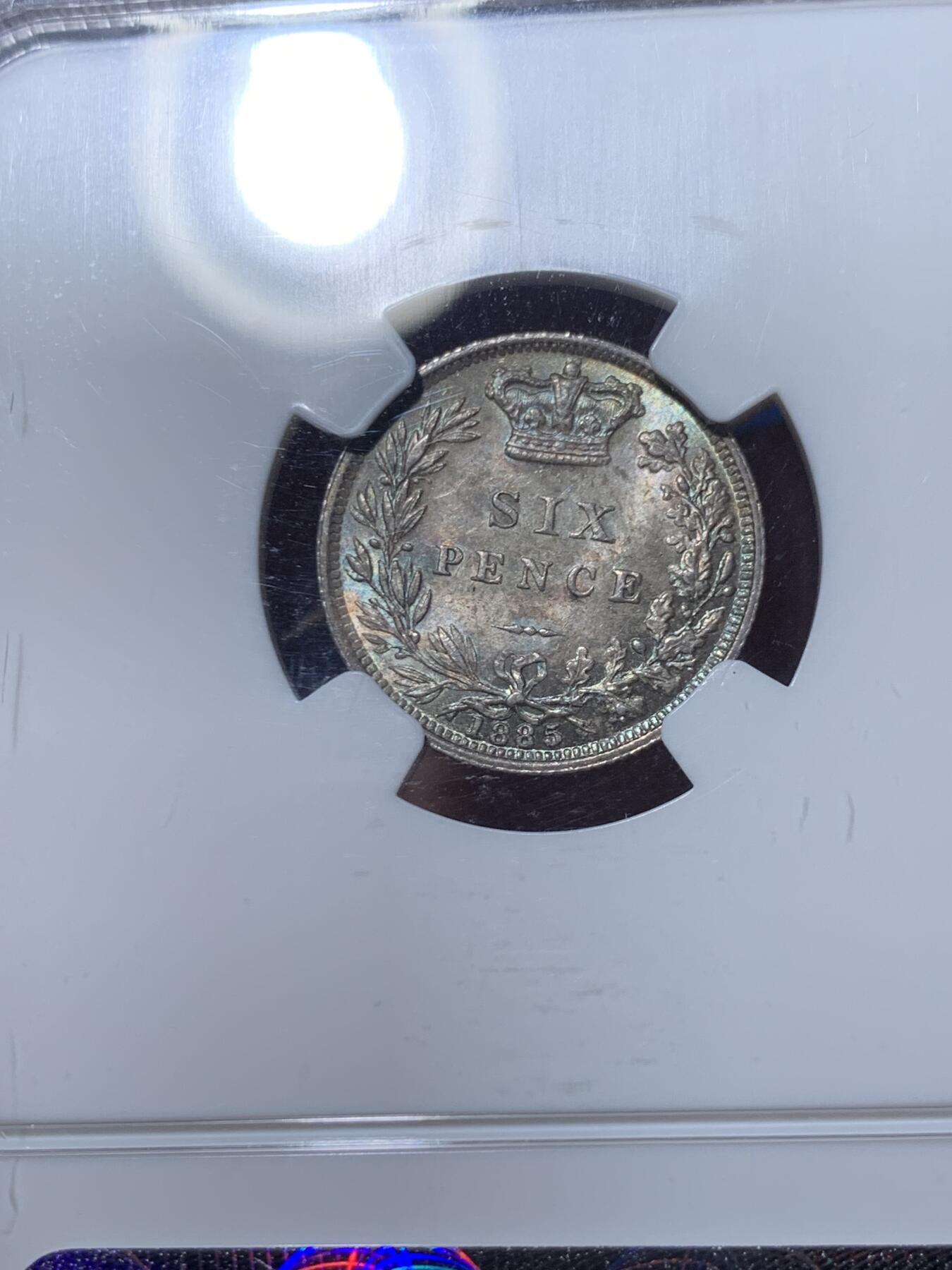 《竞宝斋》第476场 周日，周一 2场连拍 （全场包邮）欢迎送拍 NGC MS64 英国1885年小维流通6便士银币，双面青金彩，靓丽包浆，美丽动人，老N盒品质保障。英系凑套精品，克书价250美金