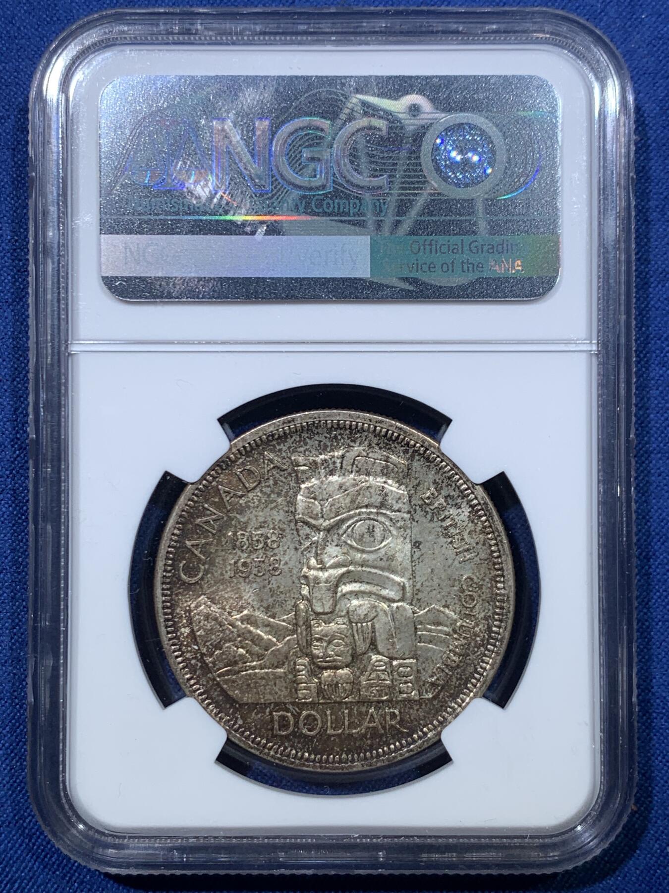 《竞宝斋》第476场 周日，周一 2场连拍 （全场包邮）欢迎送拍 NGC MS64 加拿大1958年不列颠哥伦比亚省100周年1元纪念银币，背面包浆繁星点点，分数不错