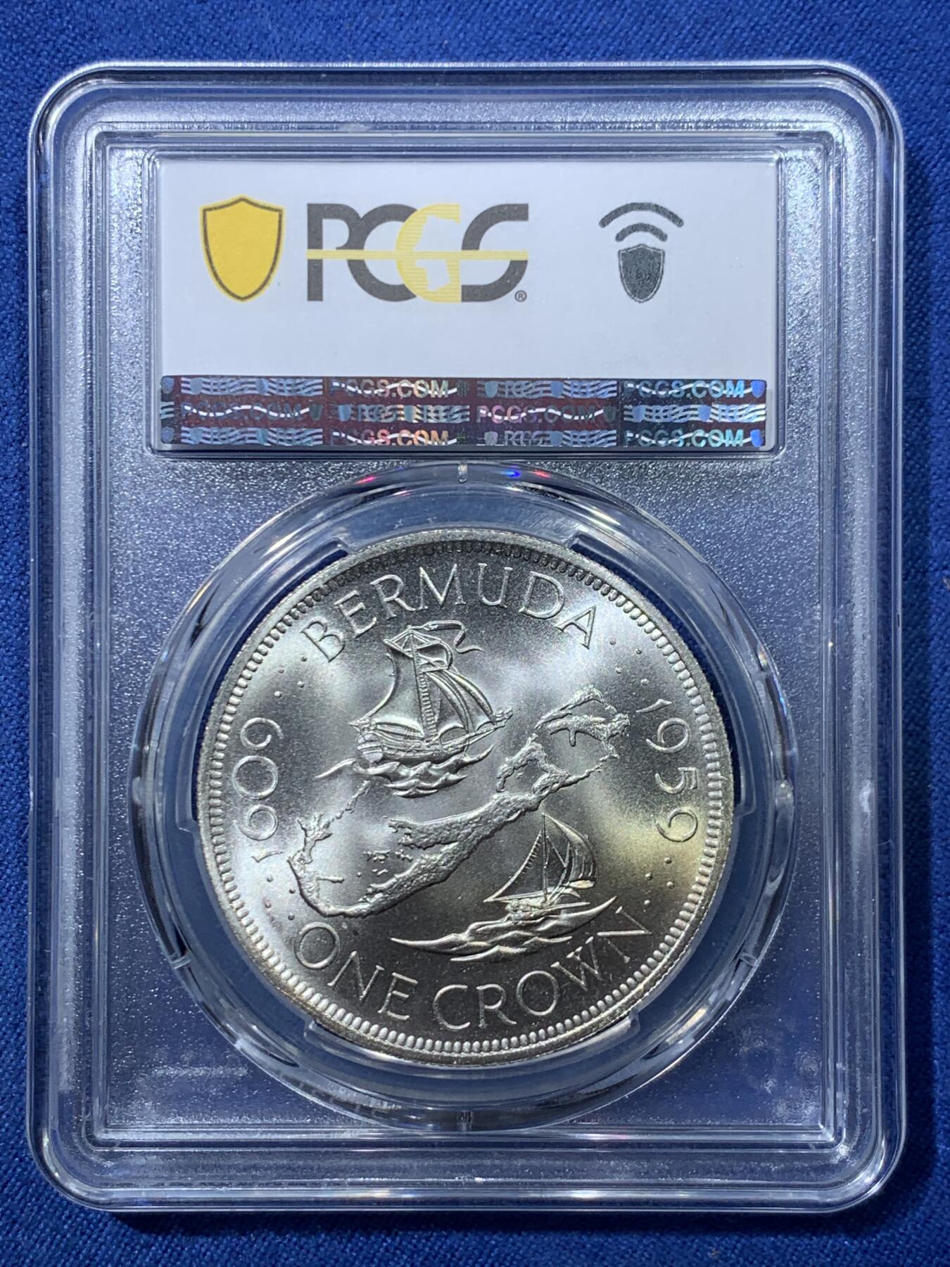 《竞宝斋》第476场 周日，周一 2场连拍 （全场包邮）欢迎送拍 PCGS MS66 英属百慕大群岛1959年伊丽莎白二世1克朗纪念银币，币面清爽干净又舒适，转光强烈细节优秀，状态极佳。