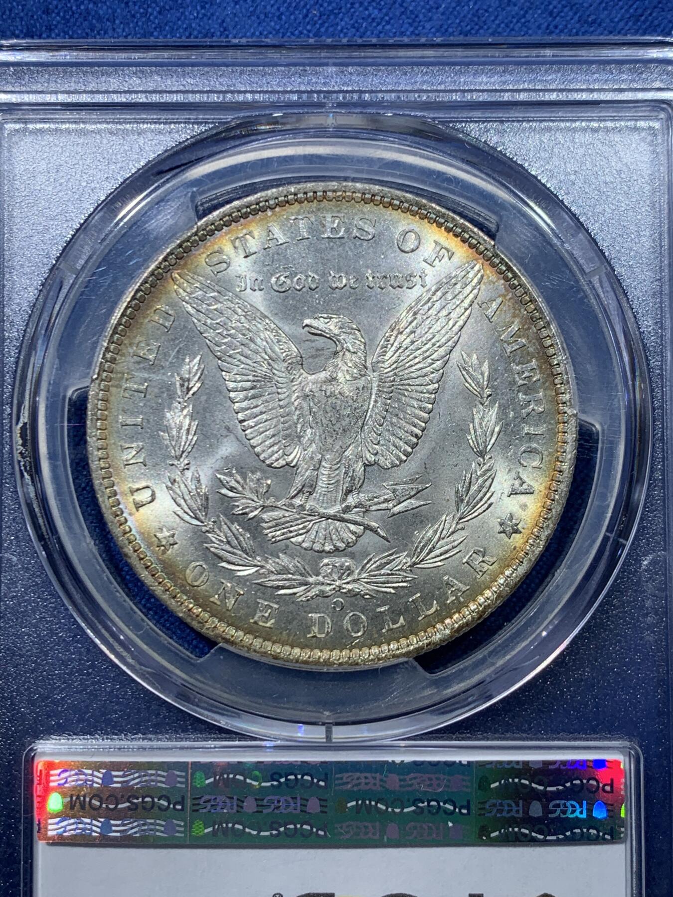 《竞宝斋》第476场 周日，周一 2场连拍 （全场包邮）欢迎送拍 PCGS MS65 美国 1885年 新奥尔良厂 1美元 摩根银币 光度非常好 边缘一圈金色包浆 很漂亮 同分中的战斗机