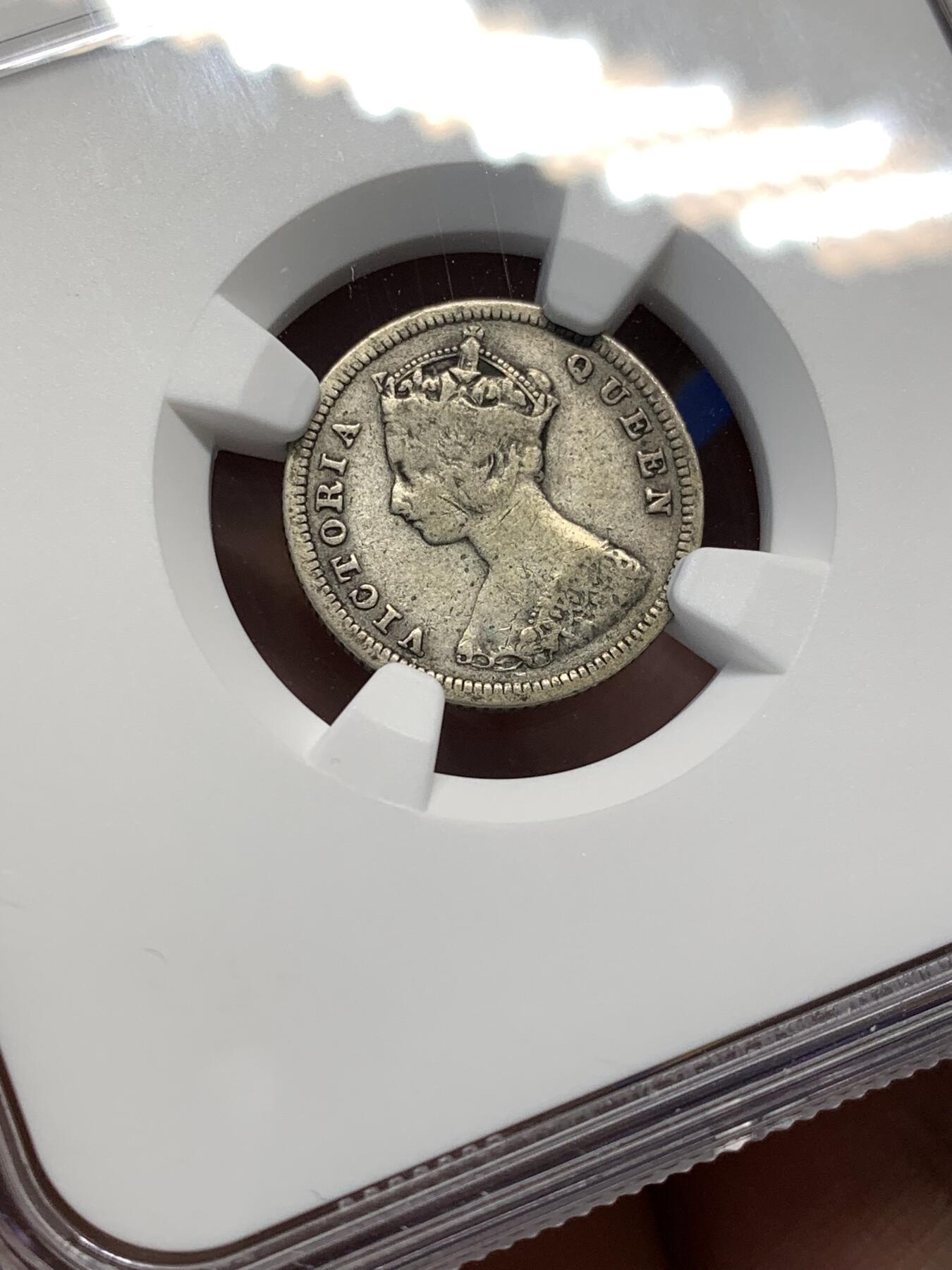 《竞宝斋》第476场 周日，周一 2场连拍 （全场包邮）欢迎送拍 NGC VF35 香港 1887年 维多利亚 一毫 银币 黑包浆 好年份 市面上少见