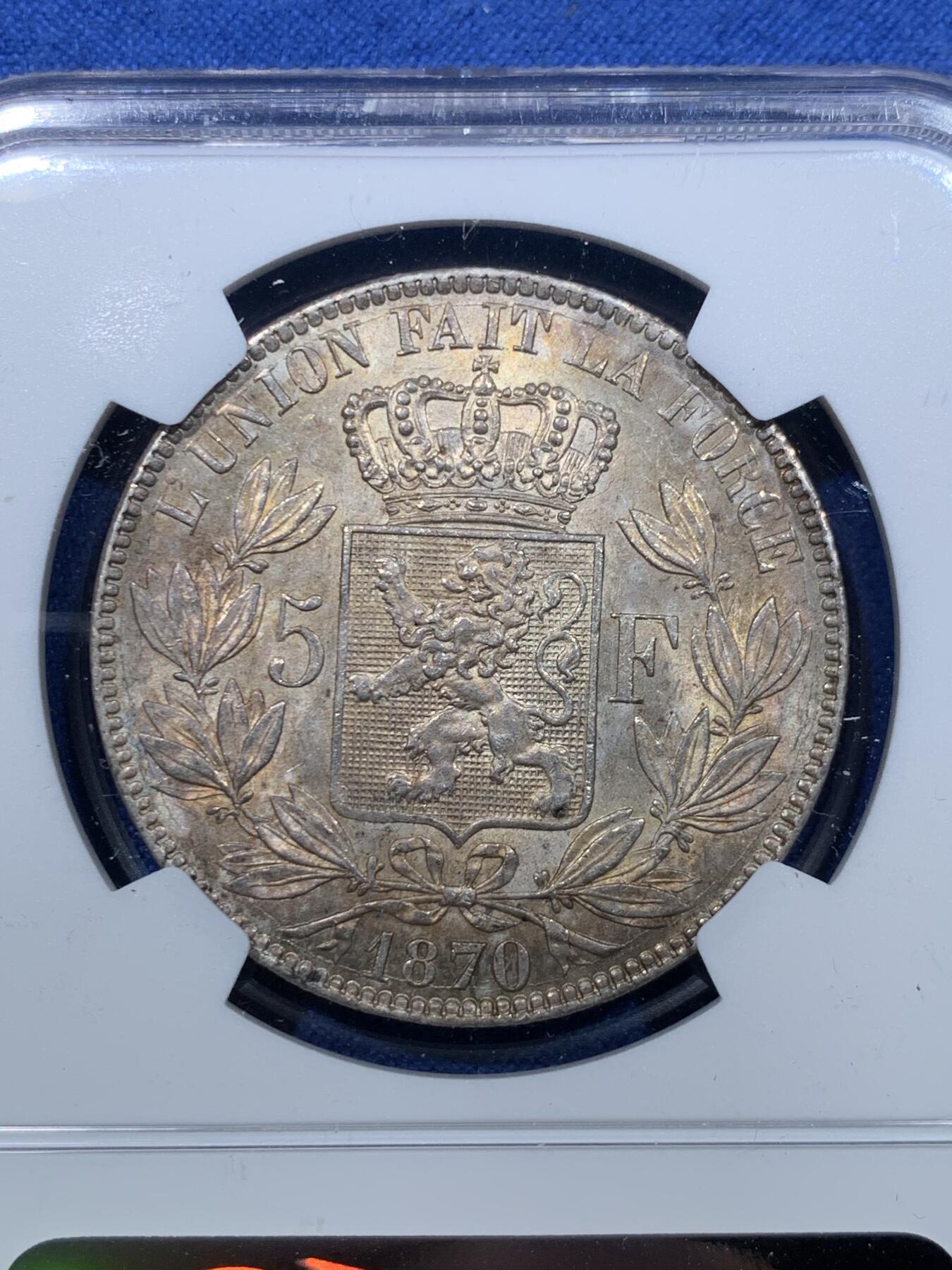 《竞宝斋》第476场 周日，周一 2场连拍 （全场包邮）欢迎送拍 NGC MS62 比利时 1870年 利奥波德二世5法郎银币 五彩包浆 光感不错