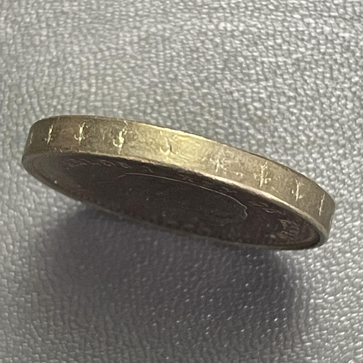 回流0406 西班牙1999年100比塞塔纪念铜币 国际老人年