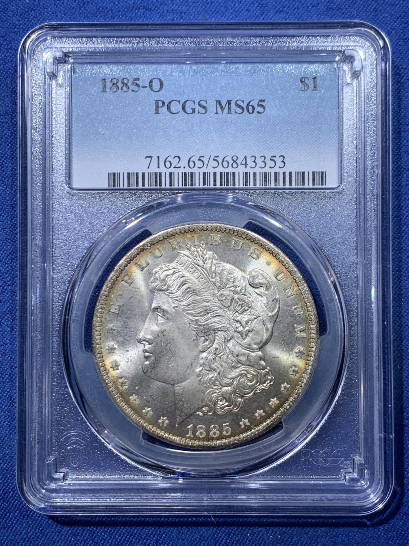 《竞宝斋》第476场 周日，周一 2场连拍 （全场包邮）欢迎送拍 PCGS MS65 美国 1885年 新奥尔良厂 1美元 摩根银币 光度非常好 边缘一圈金色包浆 很漂亮 同分中的战斗机