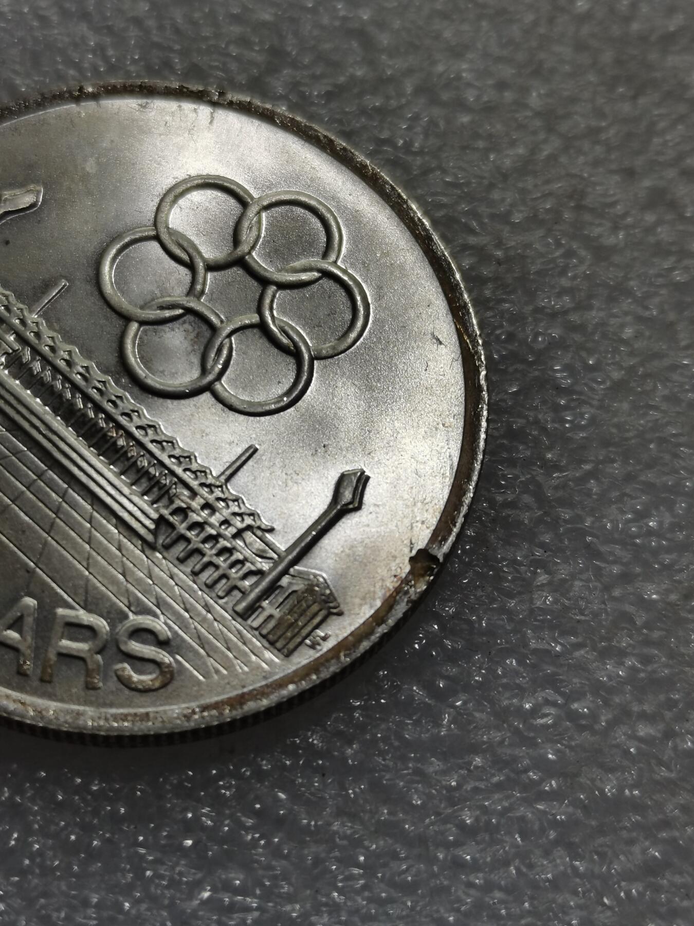 天下钱庄专场欢迎参拍 新加坡5元银币，有铸缺