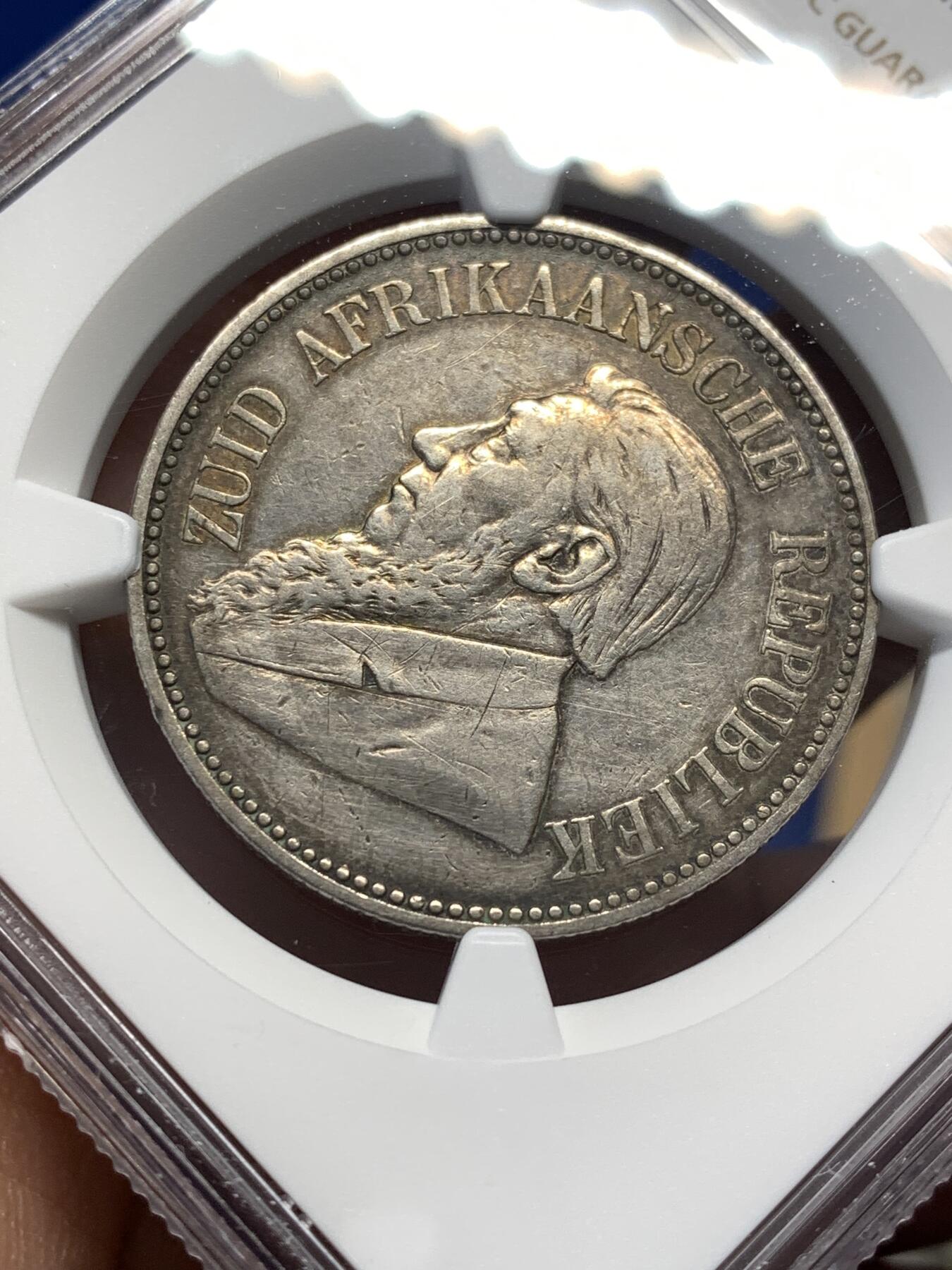 《竞宝斋》第476场 周日，周一 2场连拍 （全场包邮）欢迎送拍 NGC XFD 南非德兰士瓦1896年克鲁格总统2.5先令银币 标签年份错误