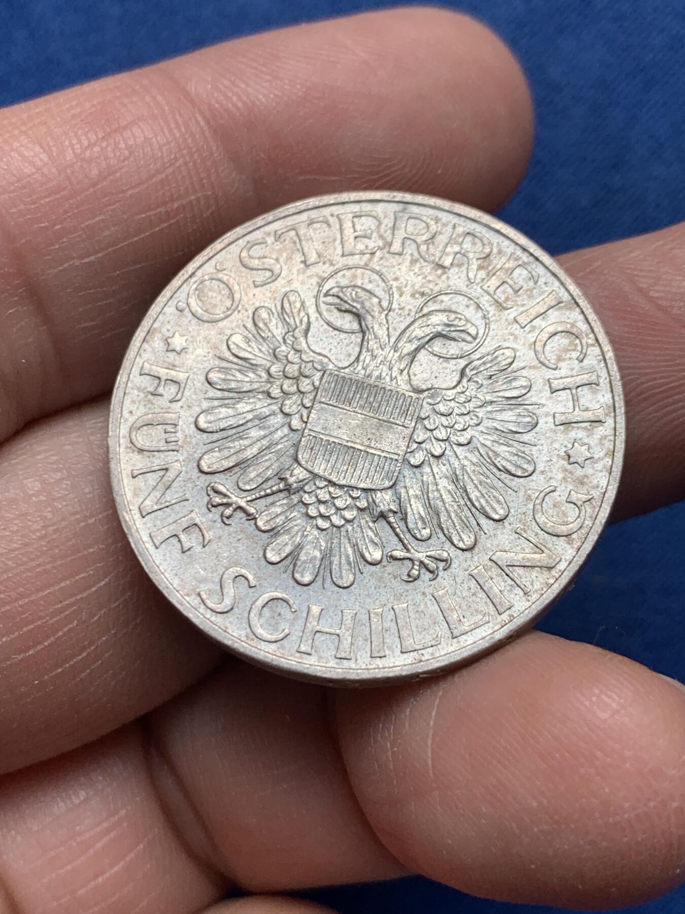 《竞宝斋》第476场 周日，周一 2场连拍 （全场包邮）欢迎送拍 奥地利1934年5先令银币，正面带光环的双鹰徽章，配奥地利盾牌；背面玛利亚泽尔圣母站立像。