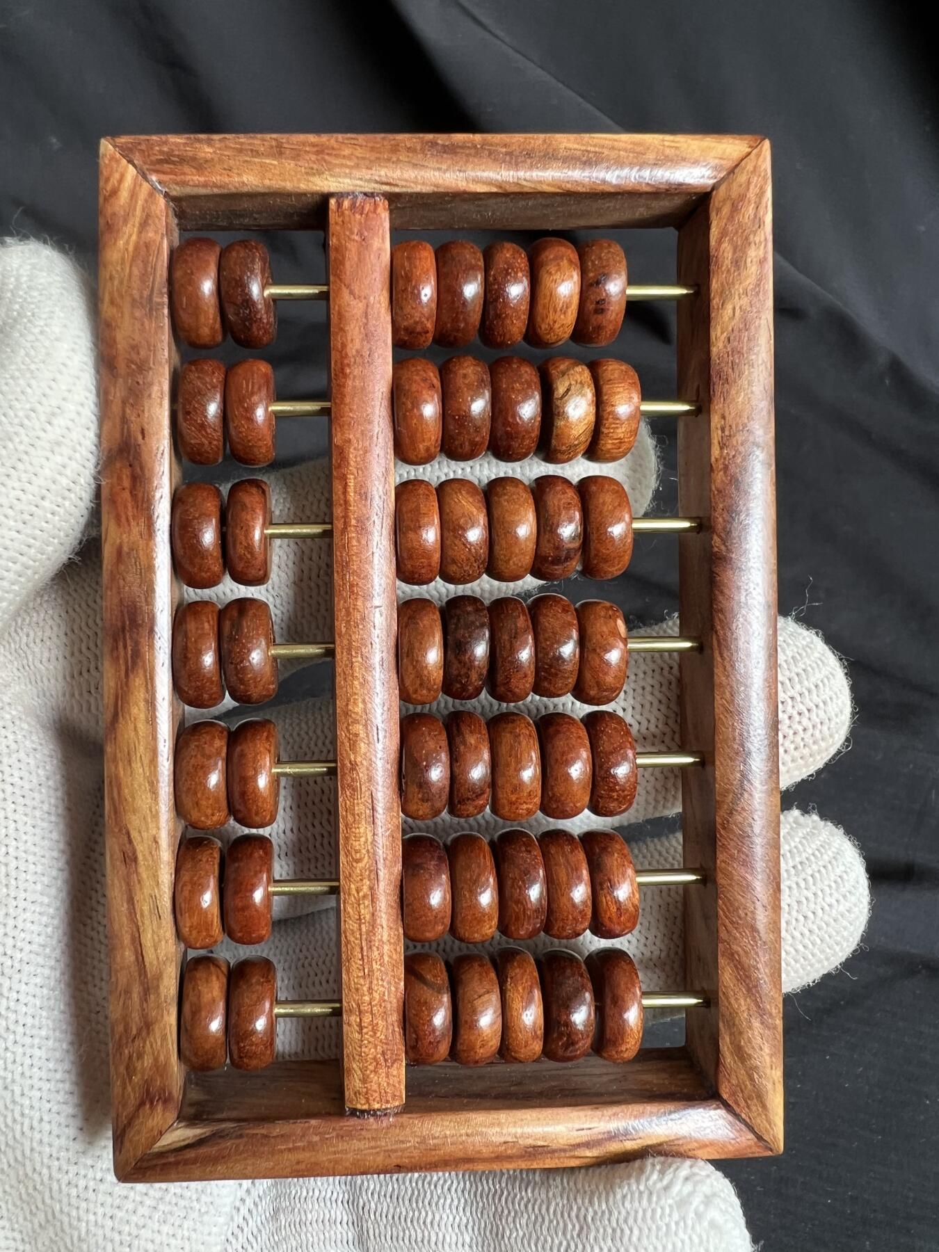 零元拍：“算盘一响，黄金万两”海南黄花梨七档小算盘。尺寸：92/60.5MM