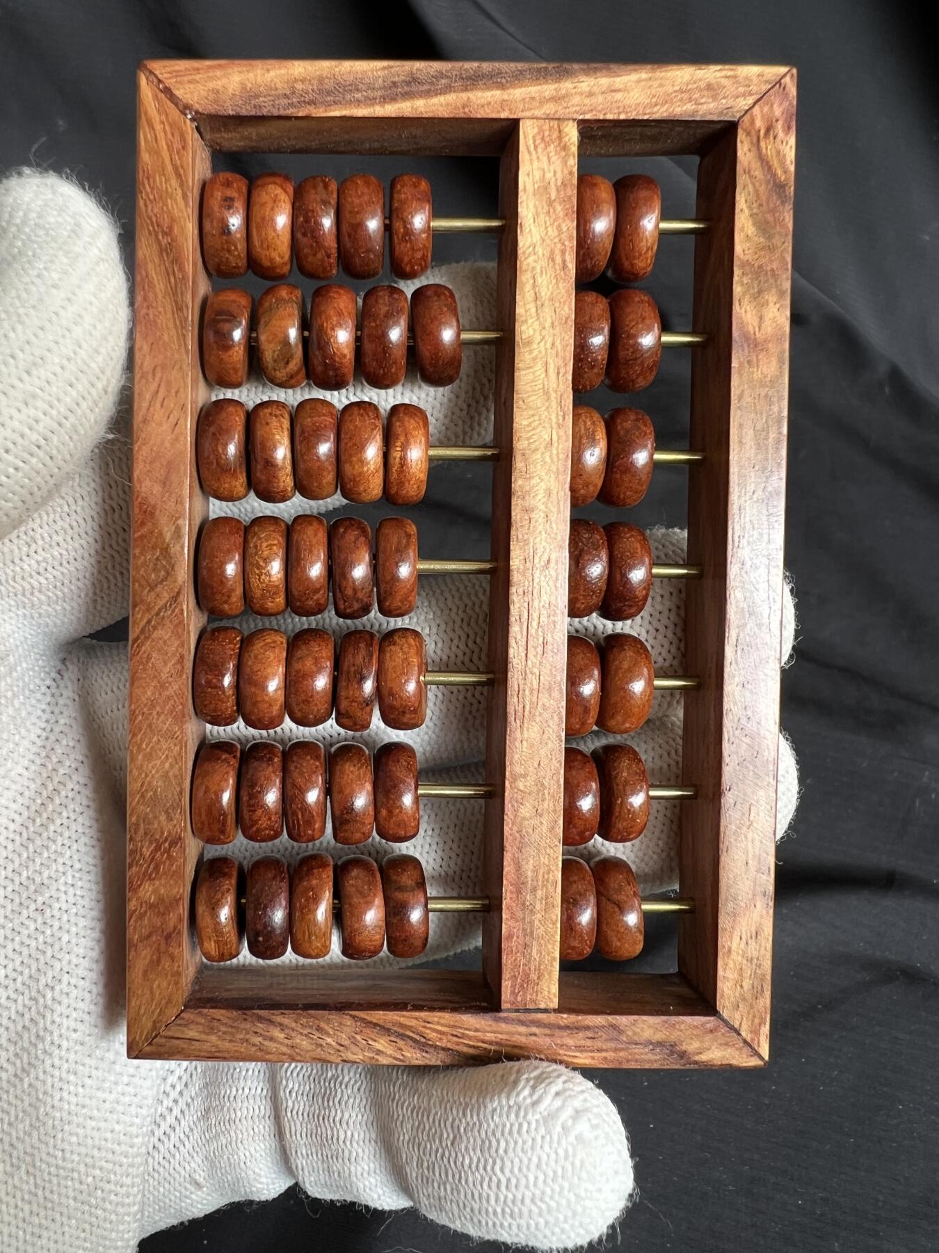 零元拍：“算盘一响，黄金万两”海南黄花梨七档小算盘。尺寸：92/60.5MM