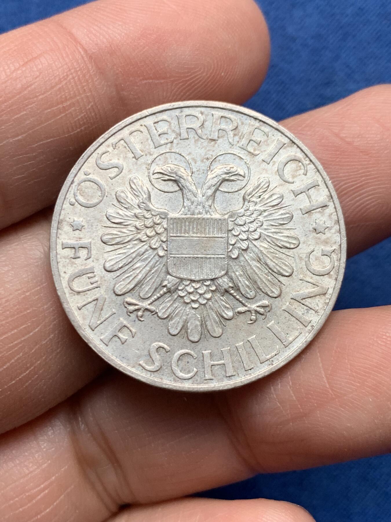 《竞宝斋》第476场 周日，周一 2场连拍 （全场包邮）欢迎送拍 奥地利1934年5先令银币，正面带光环的双鹰徽章，配奥地利盾牌；背面玛利亚泽尔圣母站立像。