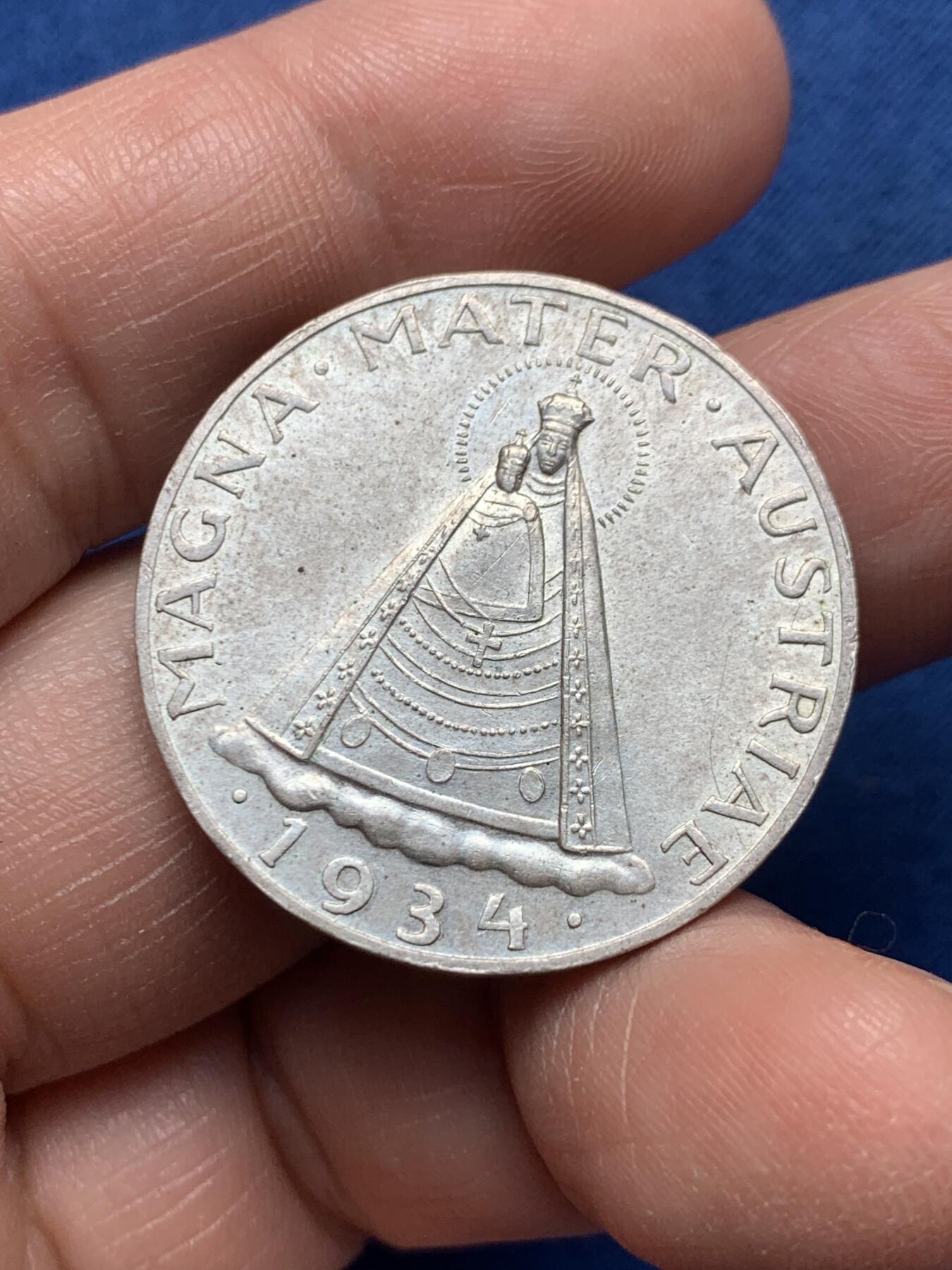 《竞宝斋》第476场 周日，周一 2场连拍 （全场包邮）欢迎送拍 奥地利1934年5先令银币，正面带光环的双鹰徽章，配奥地利盾牌；背面玛利亚泽尔圣母站立像。