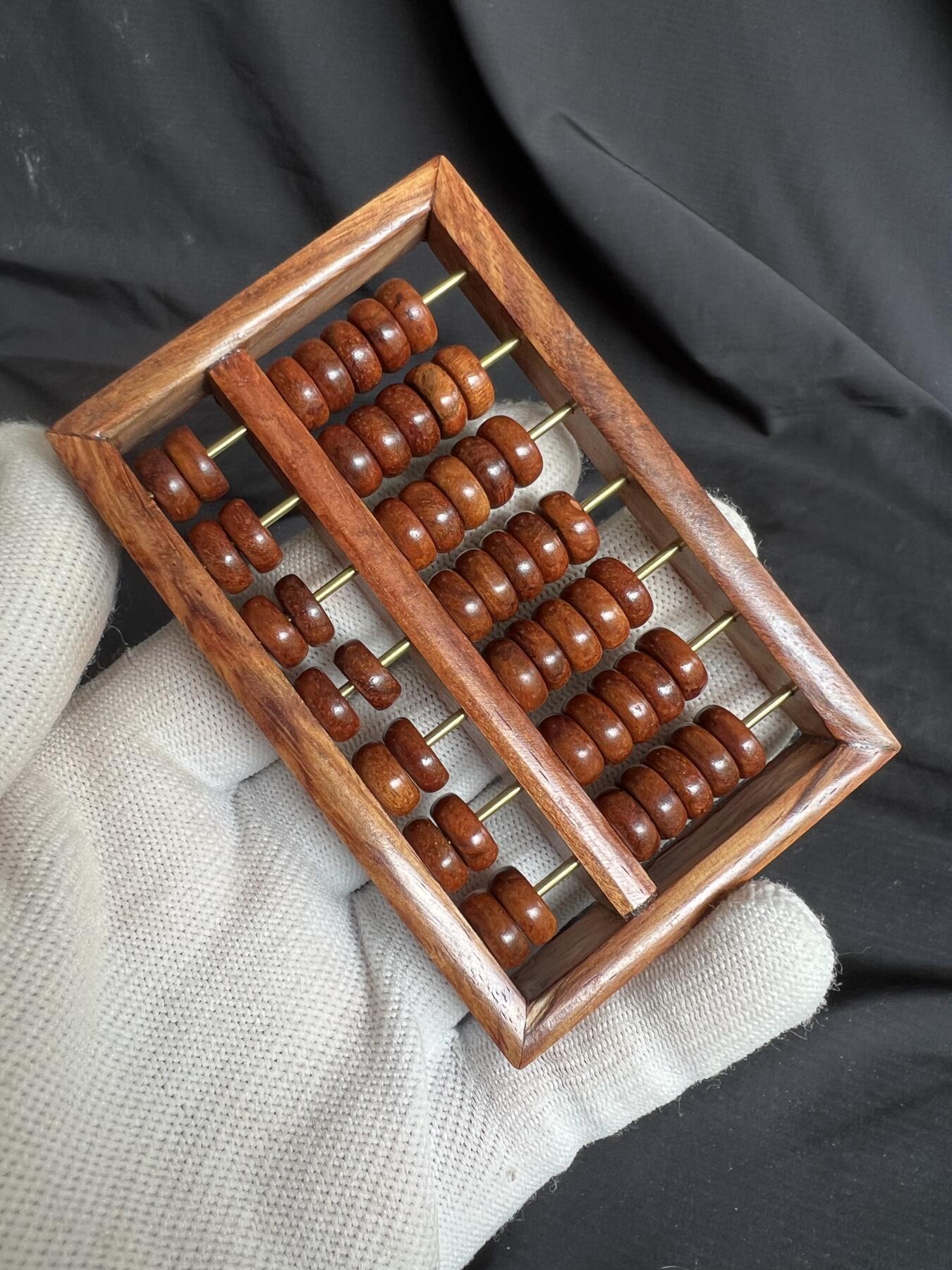 零元拍：“算盘一响，黄金万两”海南黄花梨七档小算盘。尺寸：92/60.5MM