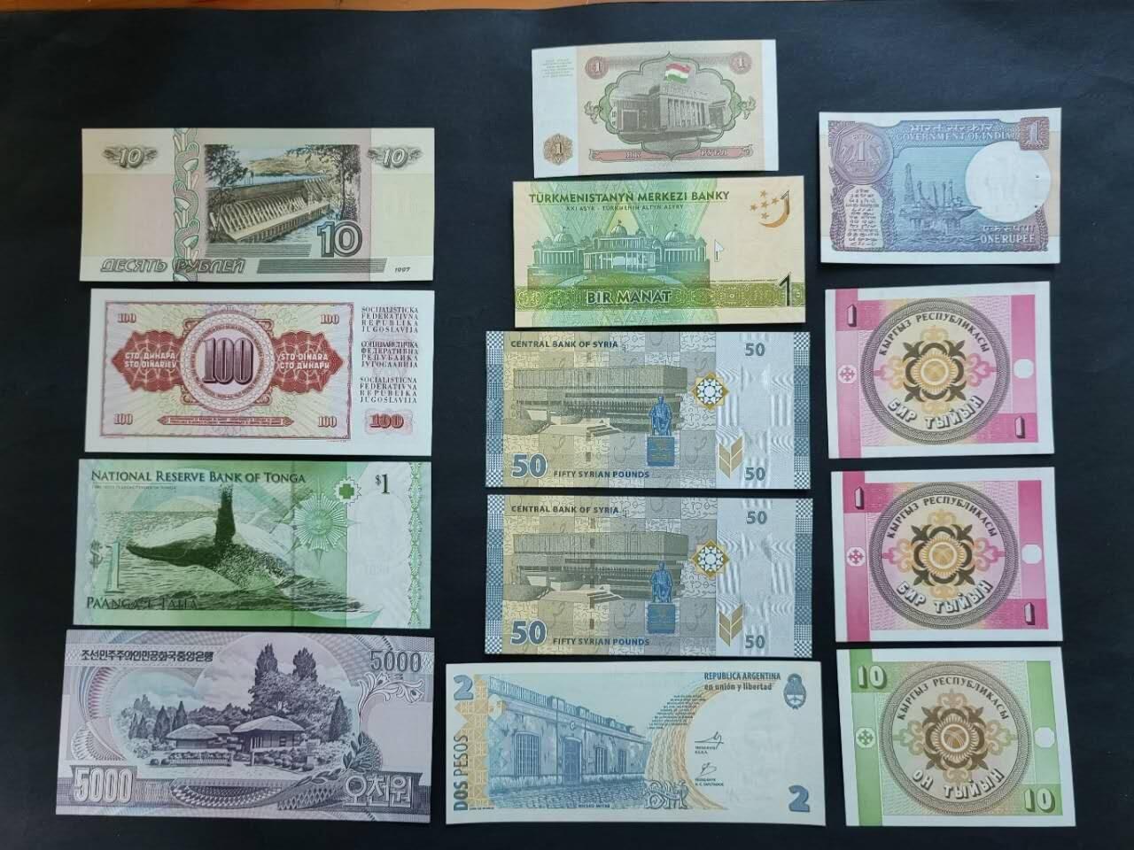 外国纸币专场260404场 不同国家13张，全新品相UNC。