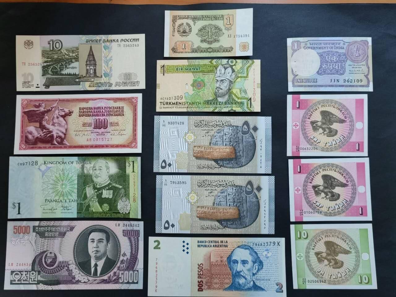 外国纸币专场260404场 不同国家13张，全新品相UNC。