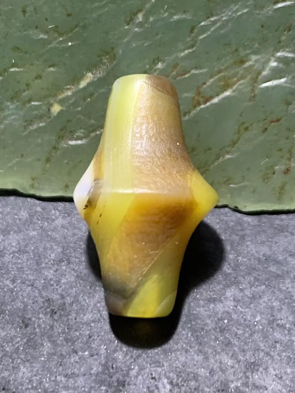 高玉化风化纹缠丝玛瑙随形碟珠一颗