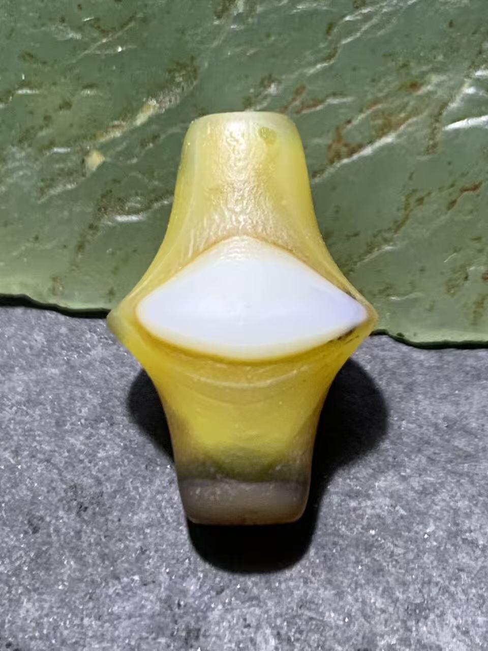 高玉化风化纹缠丝玛瑙随形碟珠一颗