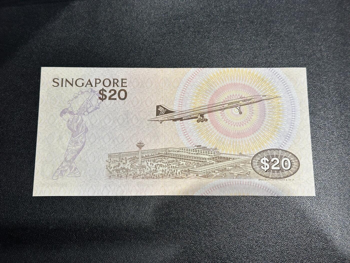 《外钞收藏家》第六百二十三期（精选场）（长期征集拍品、欢迎藏友们联系合作） 新加坡鸟版20元 全新 但荧光轻微不绝