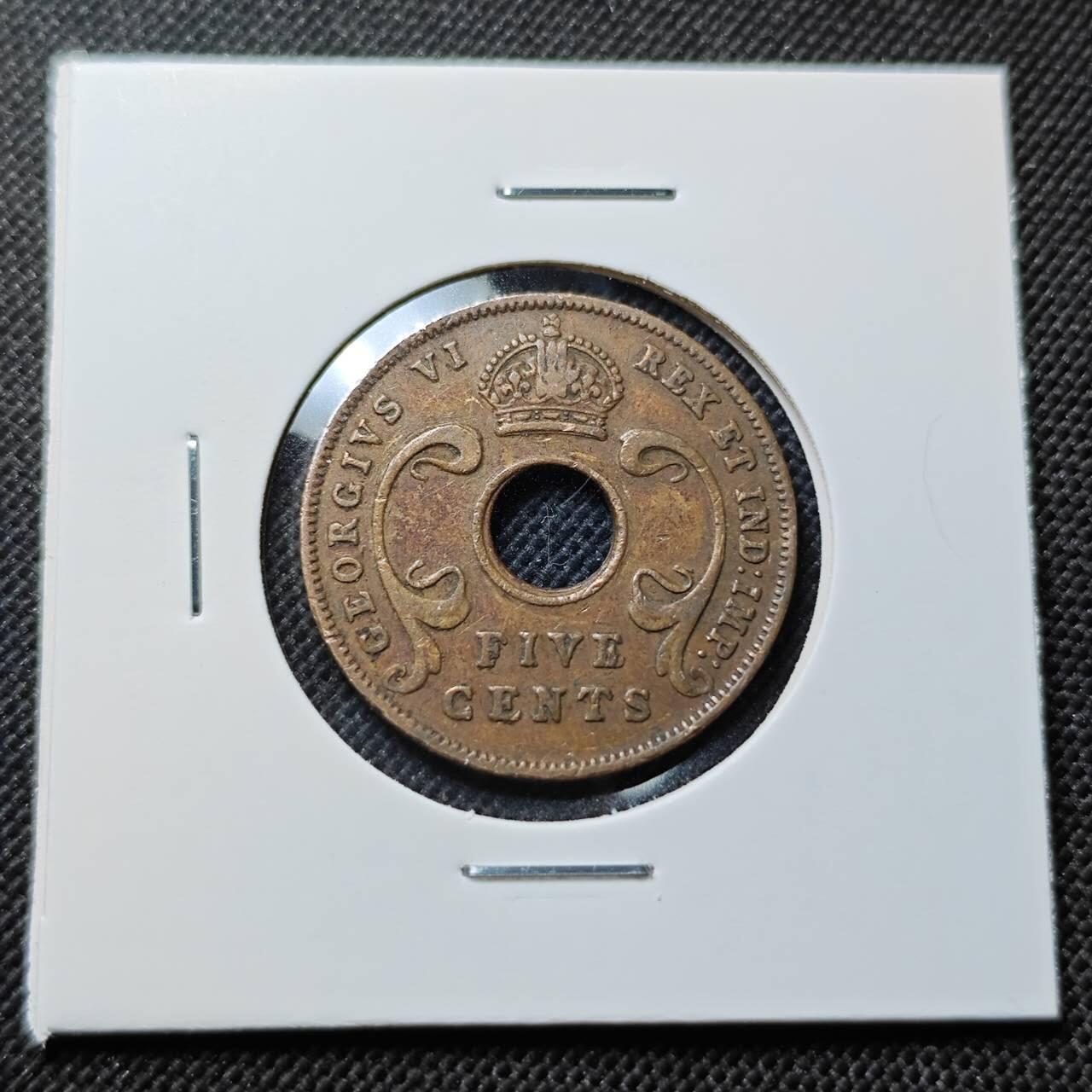 KK钱币收藏小铺  第414期 2月预留时间 周末发货 1942乌干达5分 