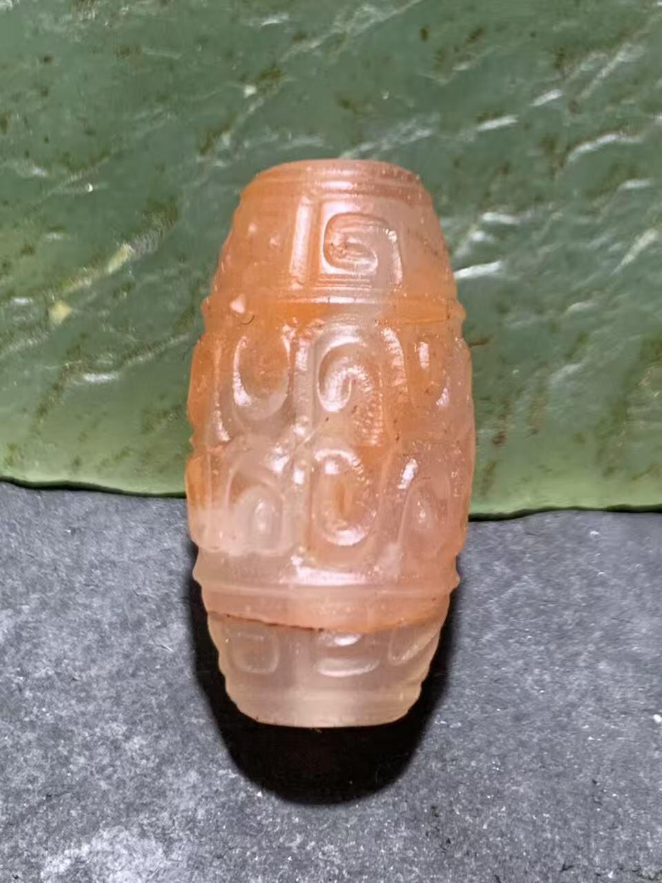 精美亚光川料荔枝冻飘红南红玛瑙雕刻回纹桶珠一个，