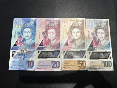 《外钞收藏家》第六百二十三期（精选场）（长期征集拍品、欢迎藏友们联系合作） -  东加勒比最新版塑料钞10-100元 4张一起 全新UNC 有两张倒置号