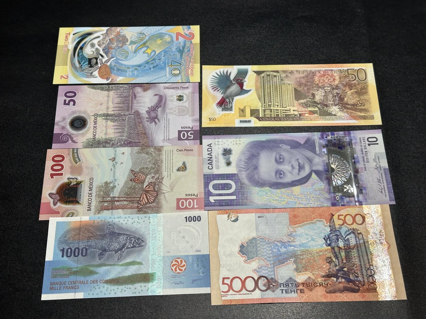 《外钞收藏家》第六百二十三期（精选场）（长期征集拍品、欢迎藏友们联系合作） 墨西哥、科摩罗、加拿大、哈萨克斯坦等获奖钞和纪念钞 7张一起 全新UNC