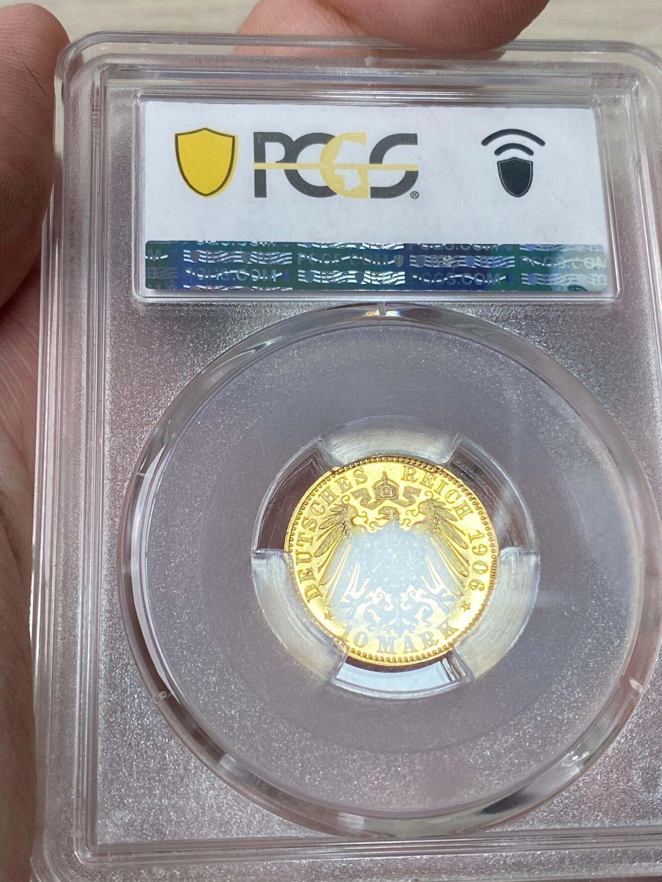 万国钱币拍卖第064期 PCGS PR63CAM 1906年德国萨克森阿尔伯特国王长翅精制10马克金币 深度镜面精制黄金地板 高浮雕喷砂质感 PC唯一冠军分 罕见典藏品质 3.98g 900金