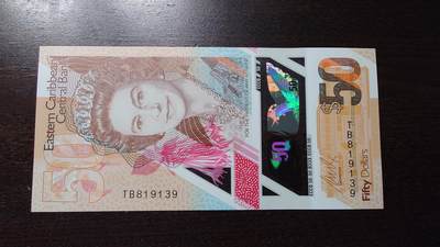 世界钱币～微拍第243期暨2026年第24期  老库存每款各1-2张清仓低价起拍 - 东加勒比50 塑料钞 全新UNC无47尾号9139 全息膜有如图正常划痕（可能是过点钞机产生）
