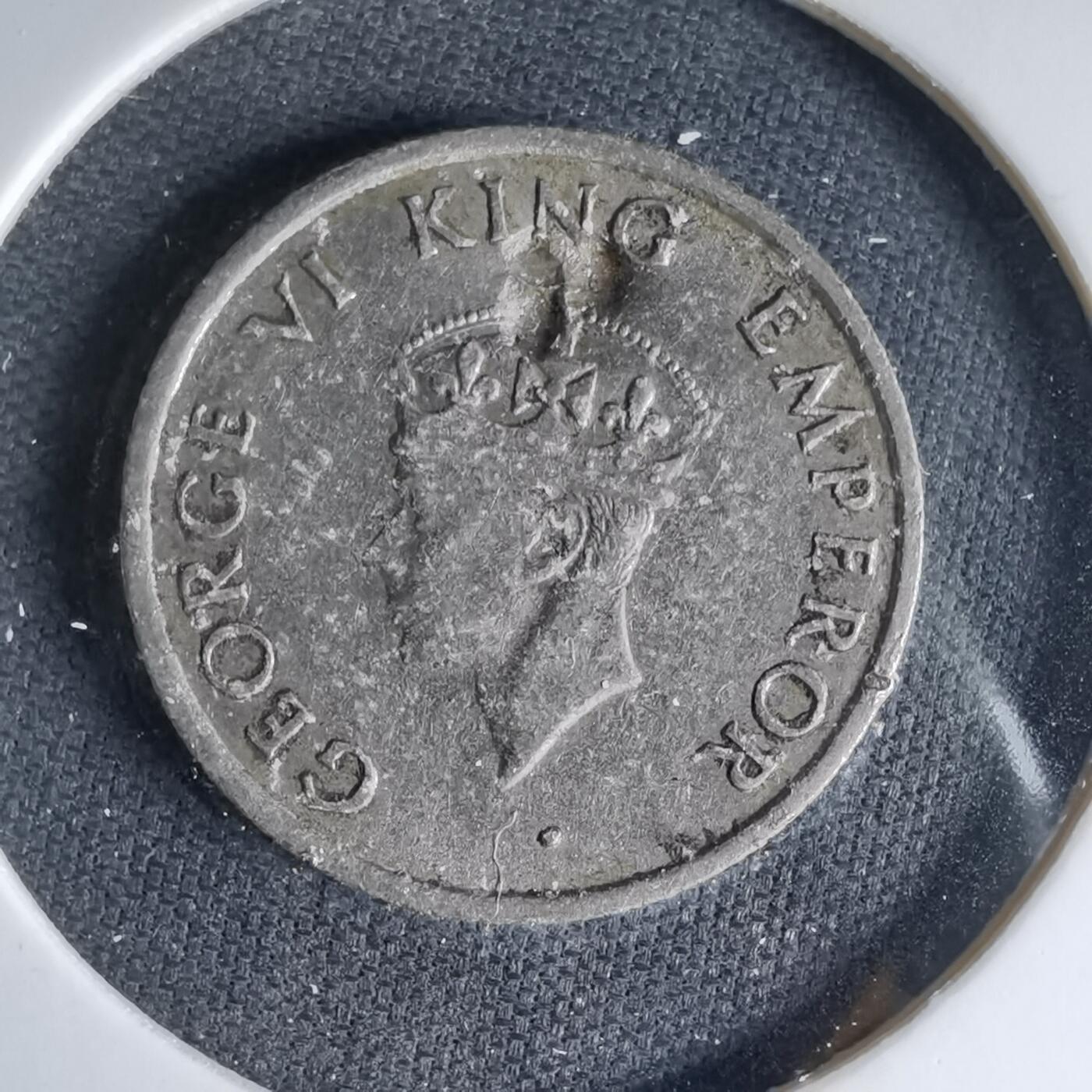 沼泽如烟--第1041场 英属东印度1946年四分之一卢比有伤