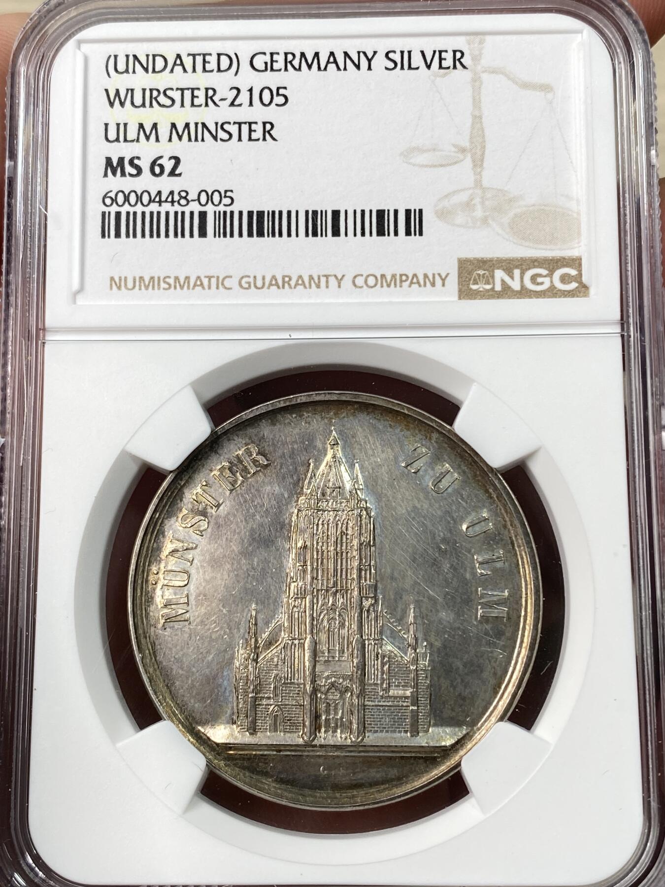 万国钱币拍卖第064期 NGC MS62 1850年左右德国符腾堡-乌尔姆学业优质纪念银章 正面是正在修建中的乌尔姆大教堂 原味淡彩环绕 深度精铸镜面喷砂大教堂极美 