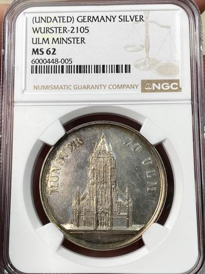 万国钱币拍卖第064期 - NGC MS62 1850年左右德国符腾堡-乌尔姆学业优质纪念银章 正面是正在修建中的乌尔姆大教堂 原味淡彩环绕 深度精铸镜面喷砂大教堂极美 