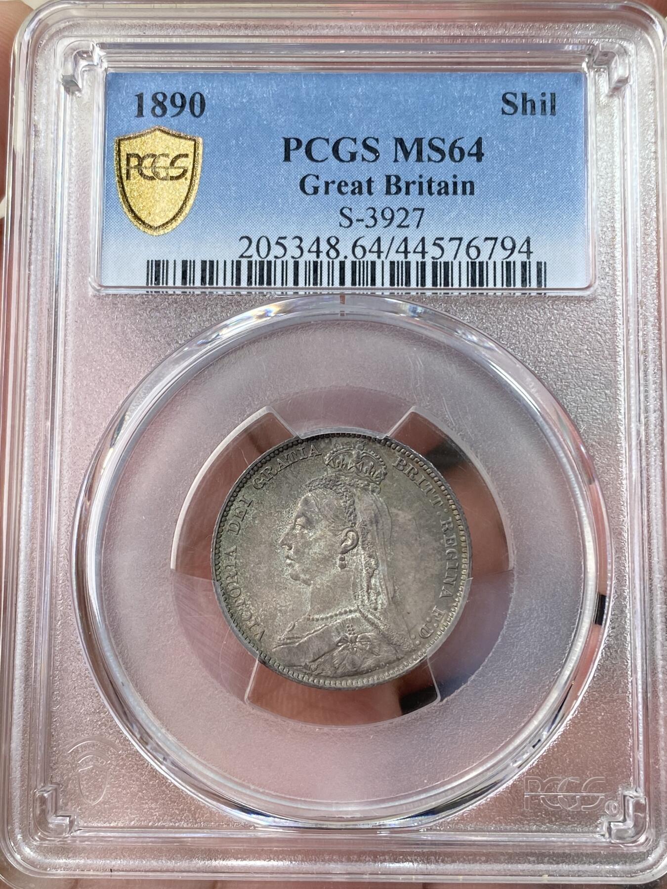 万国钱币拍卖第064期 PCGS MS64 1890年英国维多利亚女王高冠1先令 极美原味孔雀绿五彩环绕