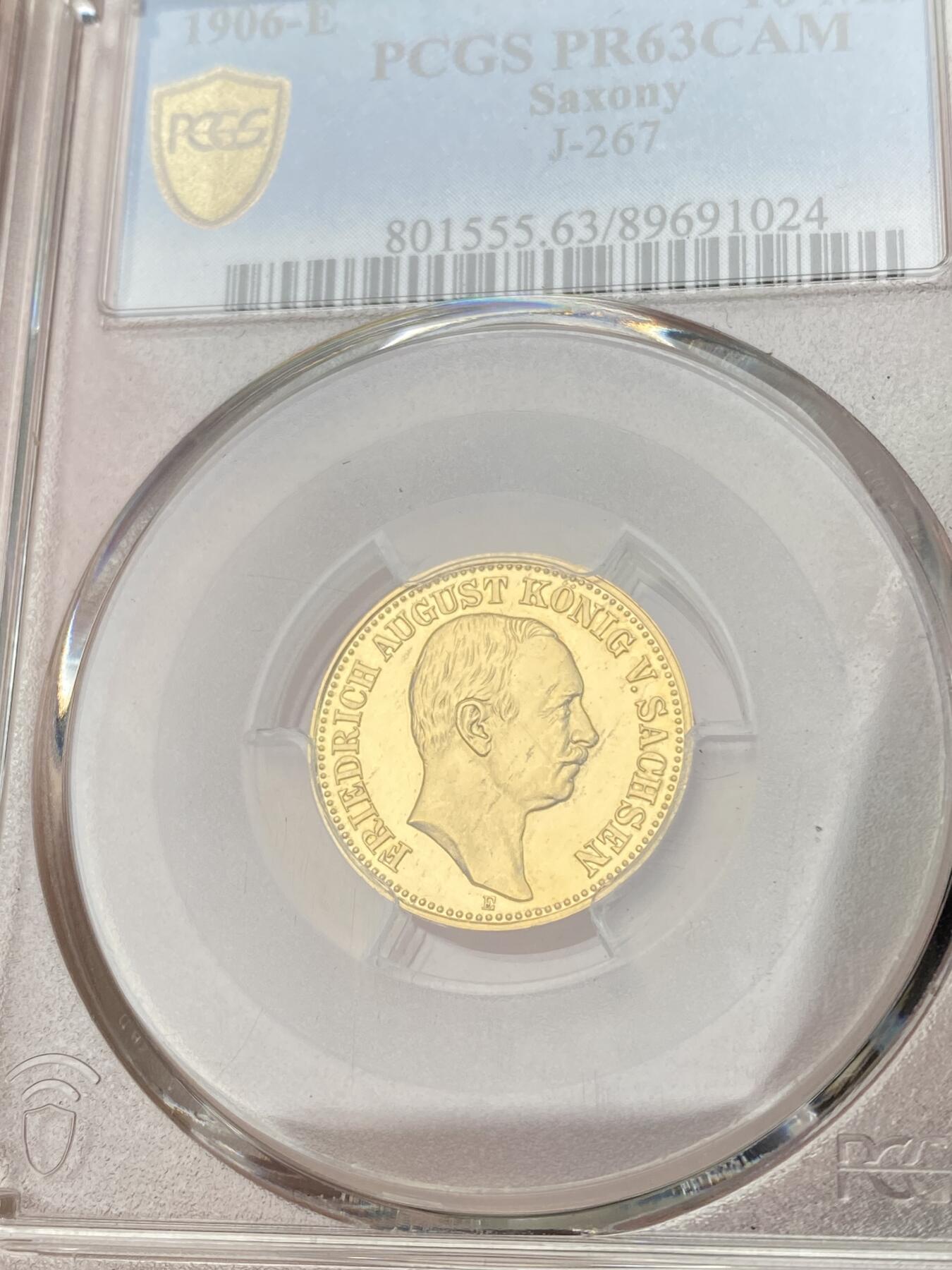 万国钱币拍卖第064期 PCGS PR63CAM 1906年德国萨克森阿尔伯特国王长翅精制10马克金币 深度镜面精制黄金地板 高浮雕喷砂质感 PC唯一冠军分 罕见典藏品质 3.98g 900金