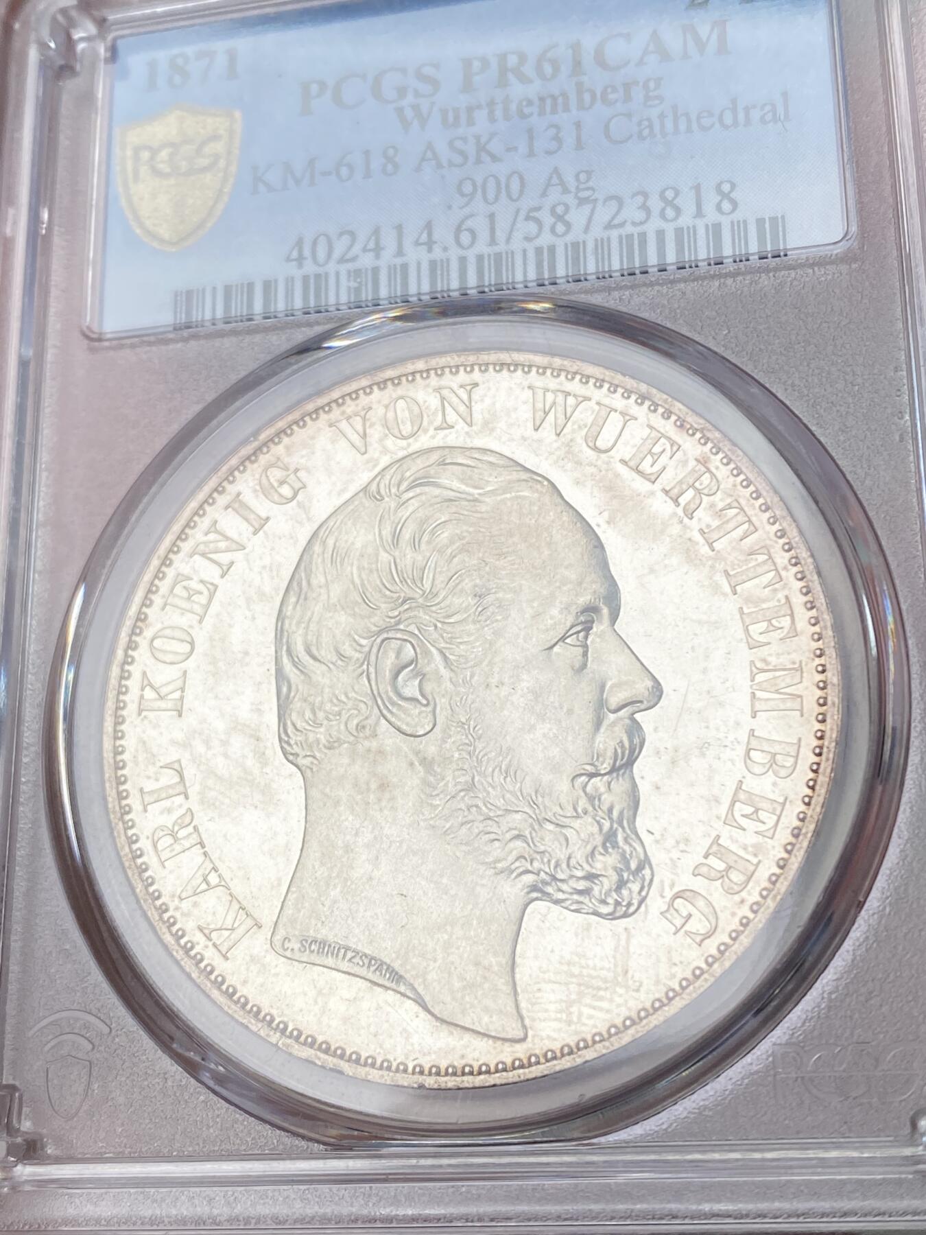 万国钱币拍卖第064期 PCGS PR61CAM 1871年德国符腾堡乌尔姆大教堂2泰勒 德系2泰勒大名誉品种 德意志精工细作的代表 精制深度镜面底板和满喷砂的人像与教堂形成强烈反差 无疑是一种视觉享受 难得CAM收藏级品质  