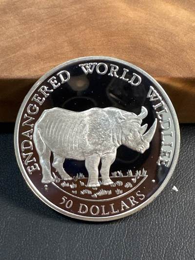 ❤️【币观天下】❤️ 第347期钱币拍卖场- 2026.4.3周五晚上6点半场 长期征集拍品  - 1990库克群岛 50 Dollars 非洲犀牛银币